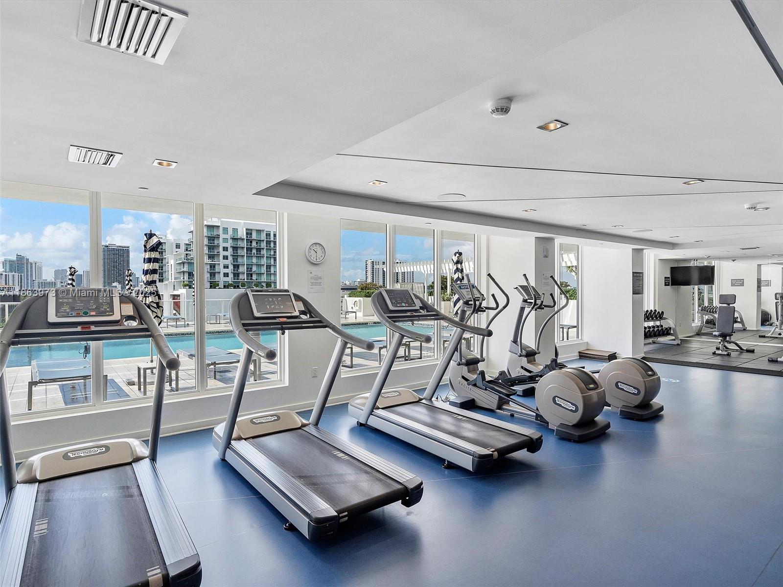4250 Biscayne Boulevard, Unit 1416 Miami, FL 33137 - Photo 40 of 55 a view of a room with gym equipment