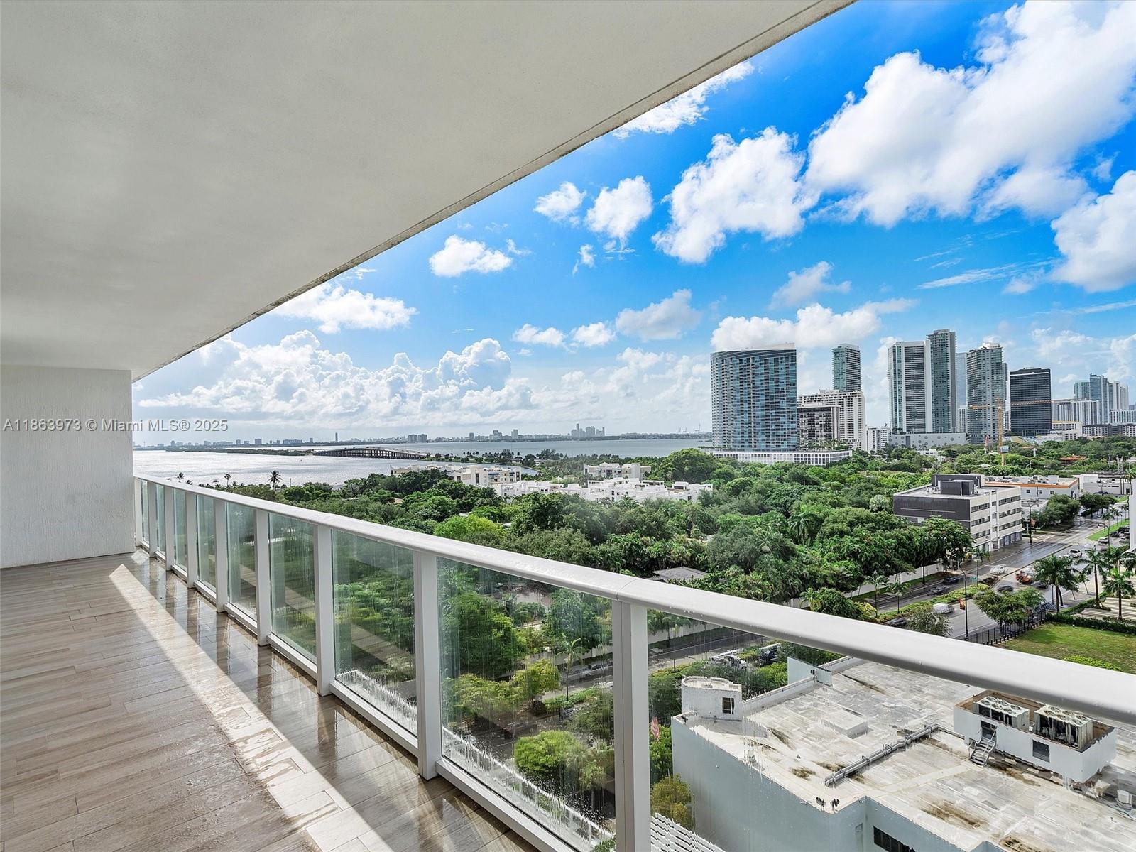 4250 Biscayne Boulevard, Unit 1416 Miami, FL 33137 - Photo 55 of 55 a view of a balcony with wooden fence