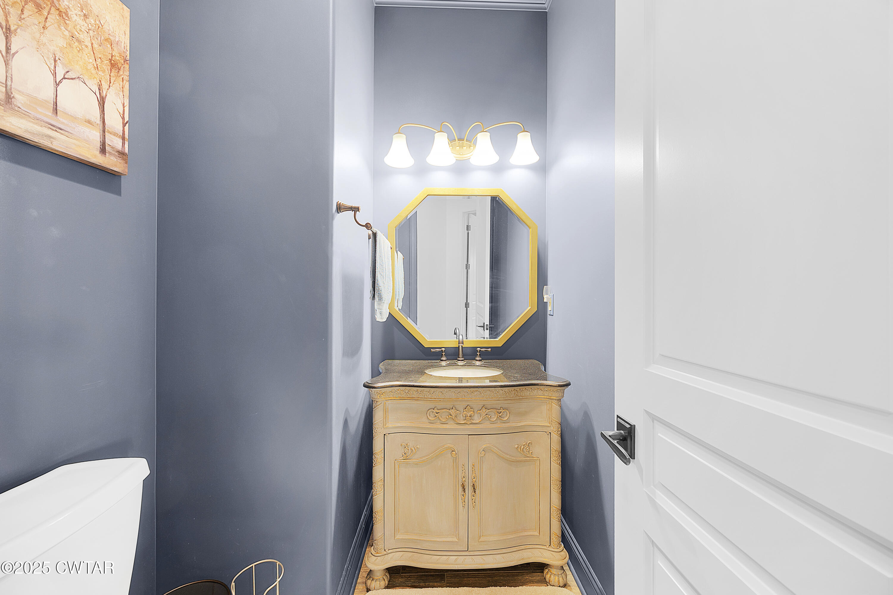 61 Rochester Cove Jackson, TN 38305 - Photo 27 of 55 a bathroom with a mirror and a sink