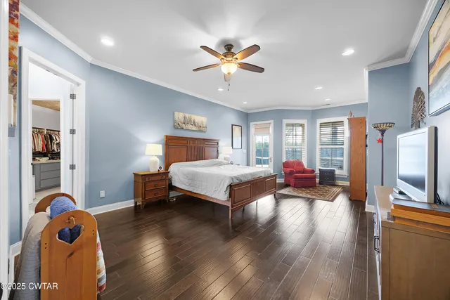 a bed room with a bed furniture and a window