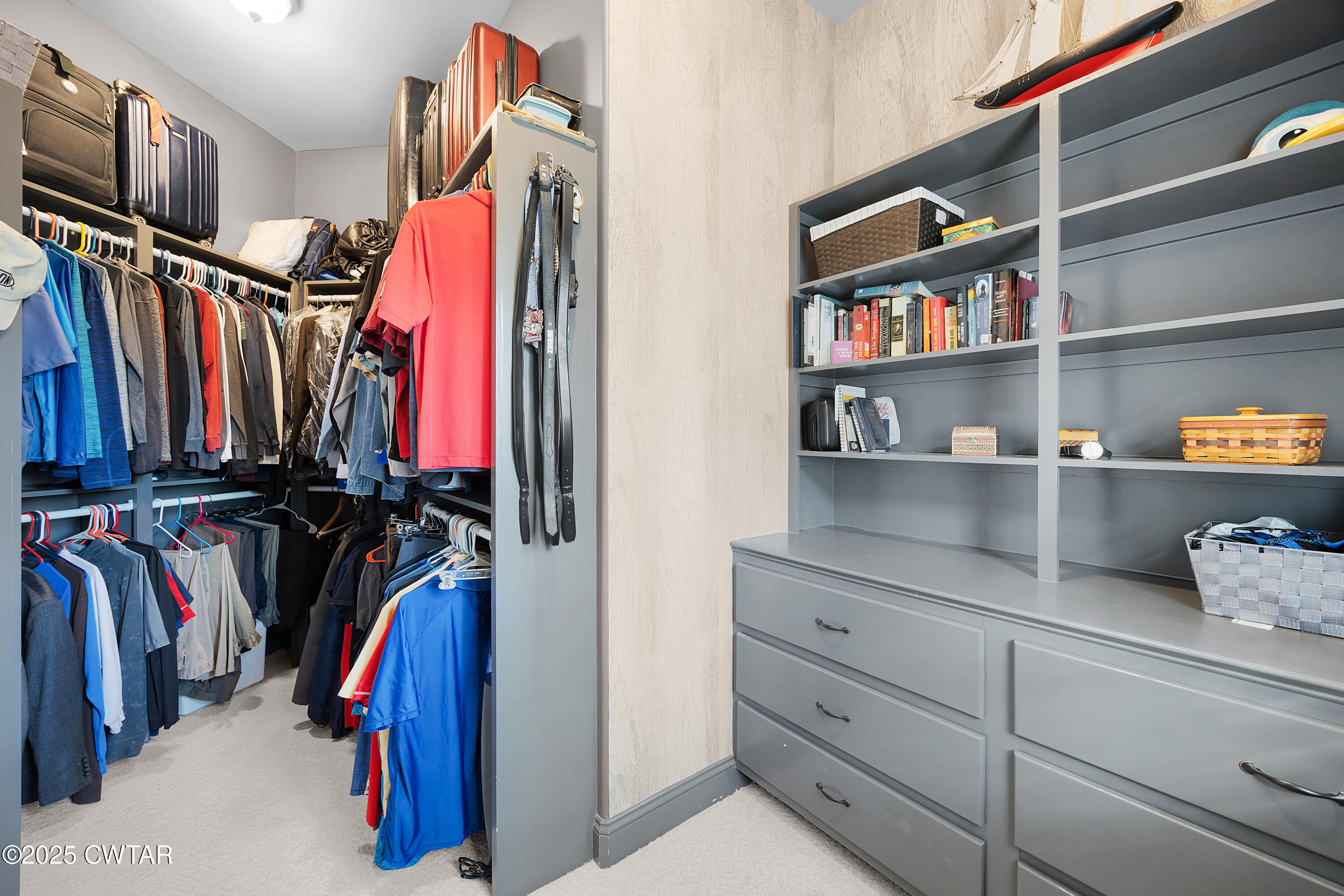 61 Rochester Cove Jackson, TN 38305 - Photo 30 of 55 a view of walk in closet with clothes and shoes