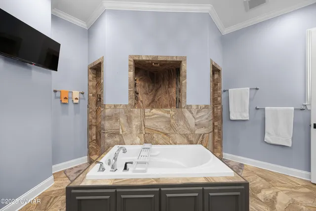 a view of bathroom with dual sinks