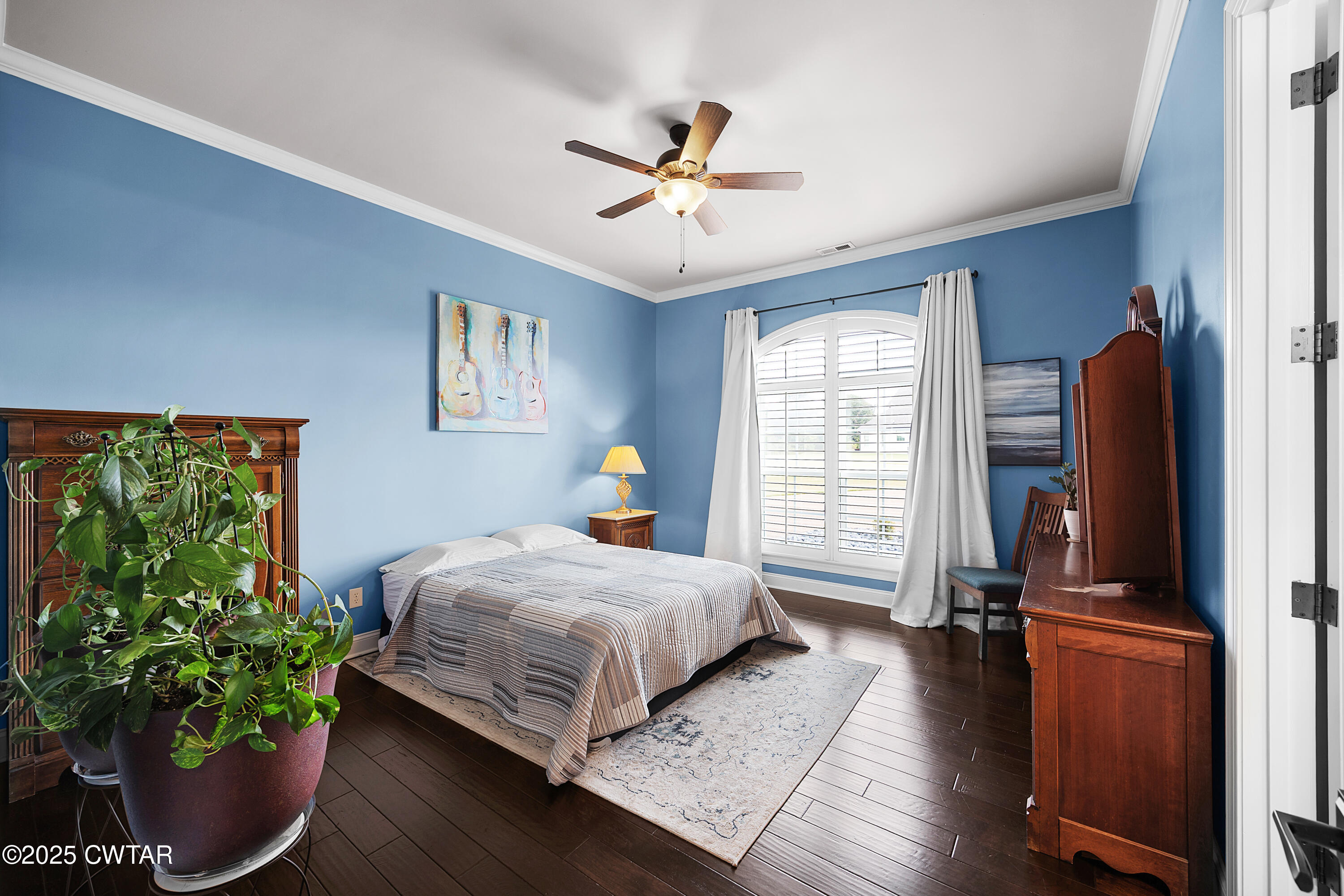 61 Rochester Cove Jackson, TN 38305 - Photo 37 of 55 a bedroom with a bed dresser and a window