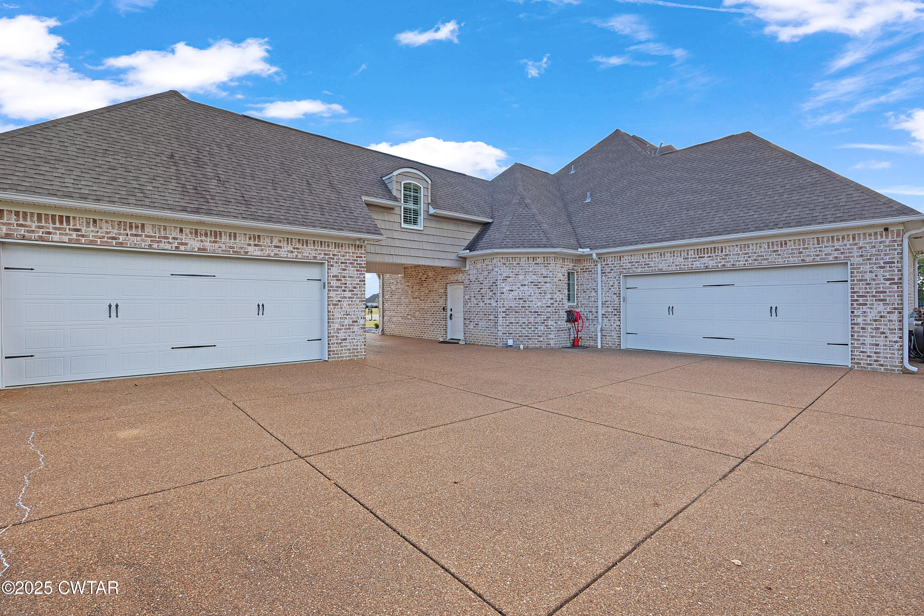 61 Rochester Cove Jackson, TN 38305 - Photo 4 of 55 front view of a house with a garage