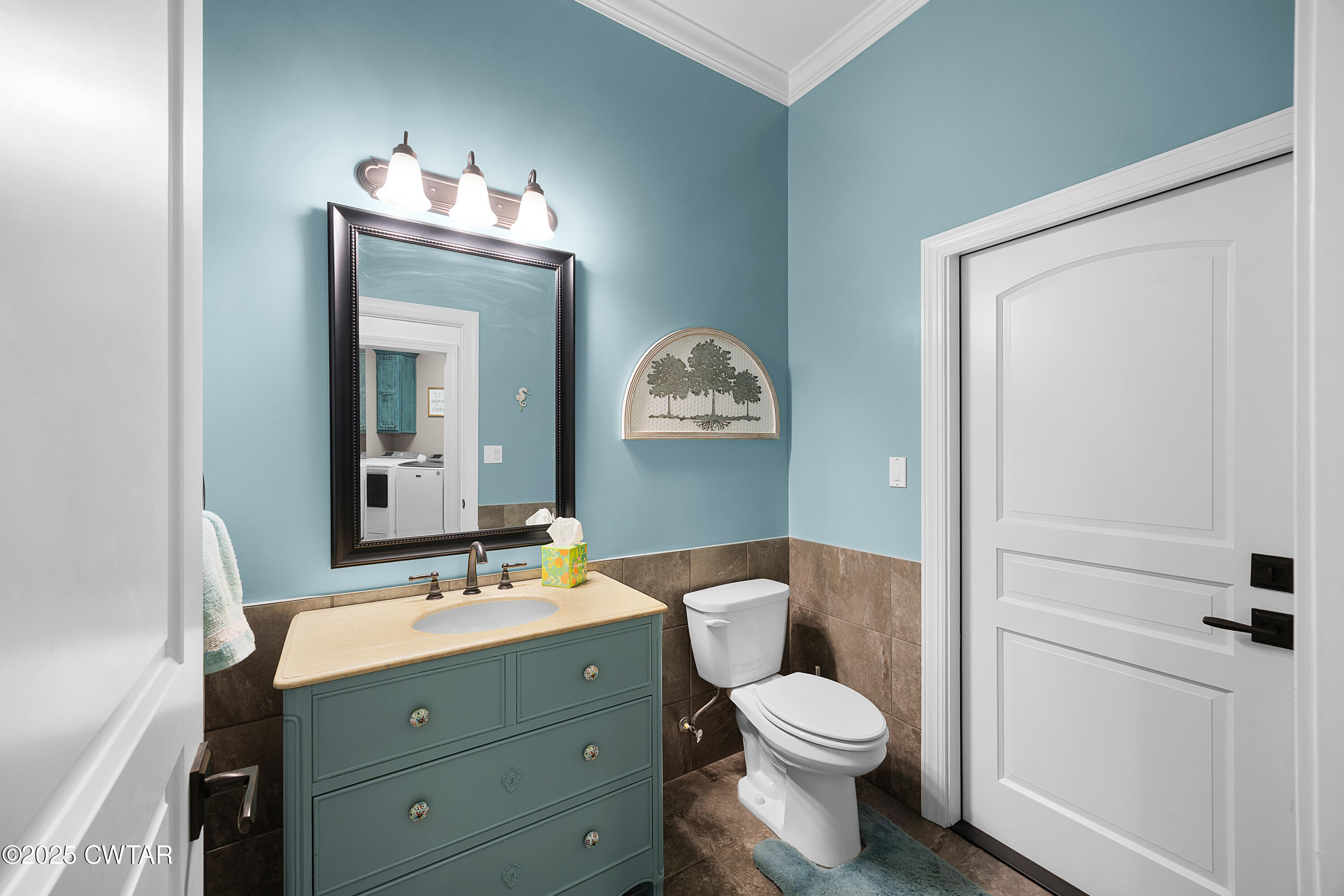 61 Rochester Cove Jackson, TN 38305 - Photo 41 of 55 a bathroom with a toilet a sink and mirror