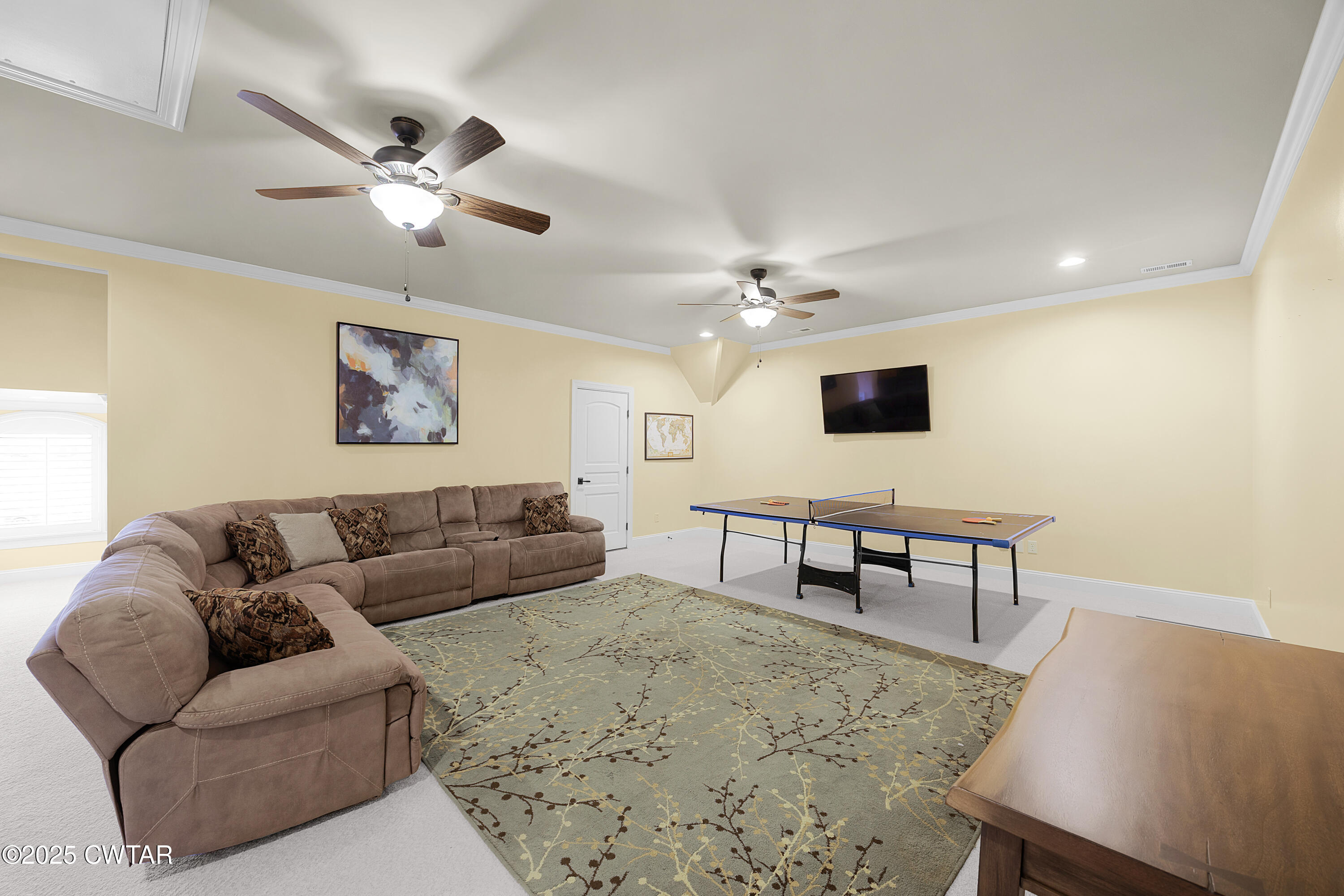 61 Rochester Cove Jackson, TN 38305 - Photo 43 of 55 a living room with furniture and a flat screen tv