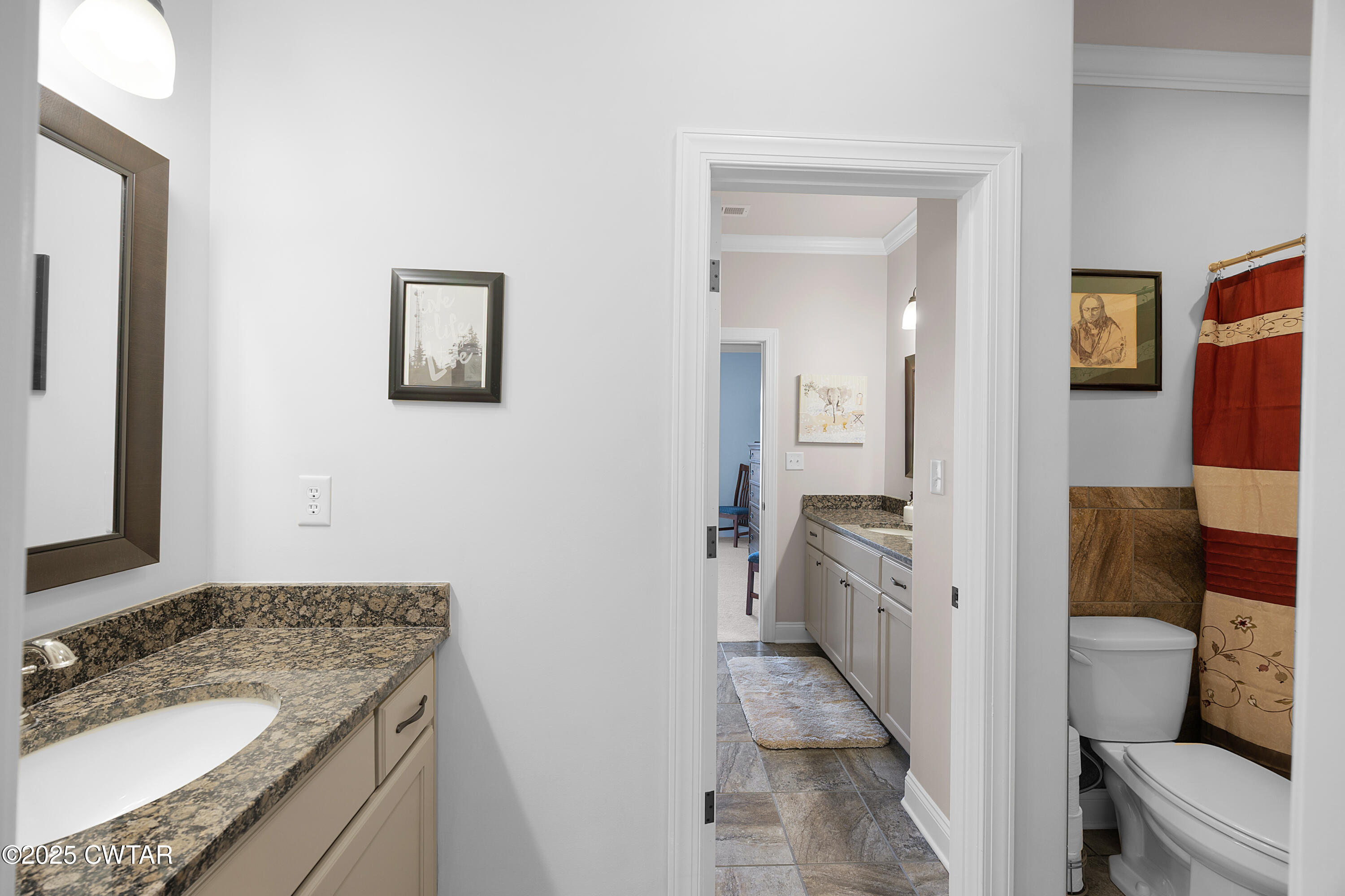 61 Rochester Cove Jackson, TN 38305 - Photo 45 of 55 a spacious bathroom with a granite countertop sink and a mirror