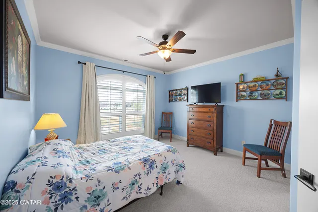 a view of a dining room with furniture and window