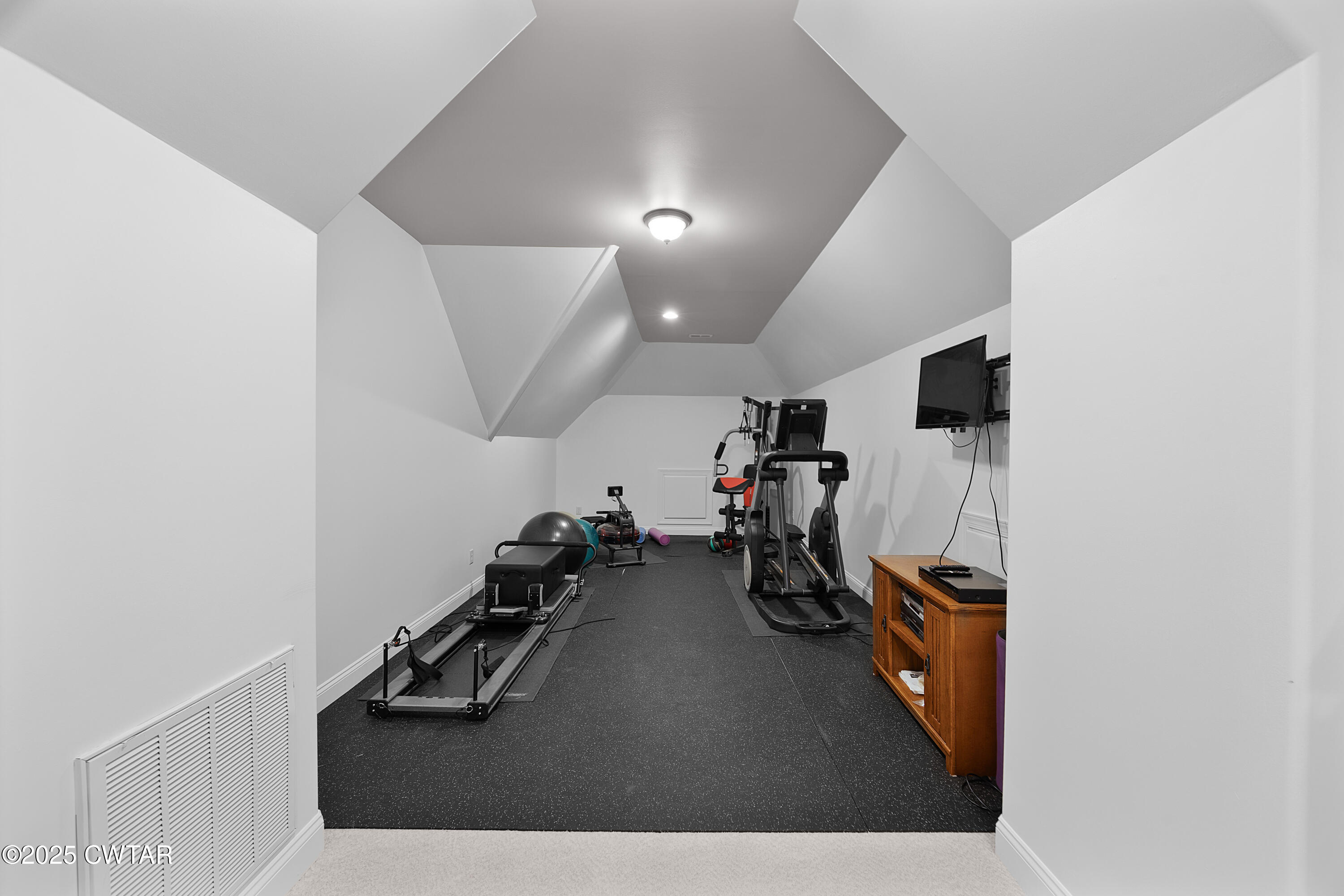 61 Rochester Cove Jackson, TN 38305 - Photo 51 of 55 a view of a room with gym equipment