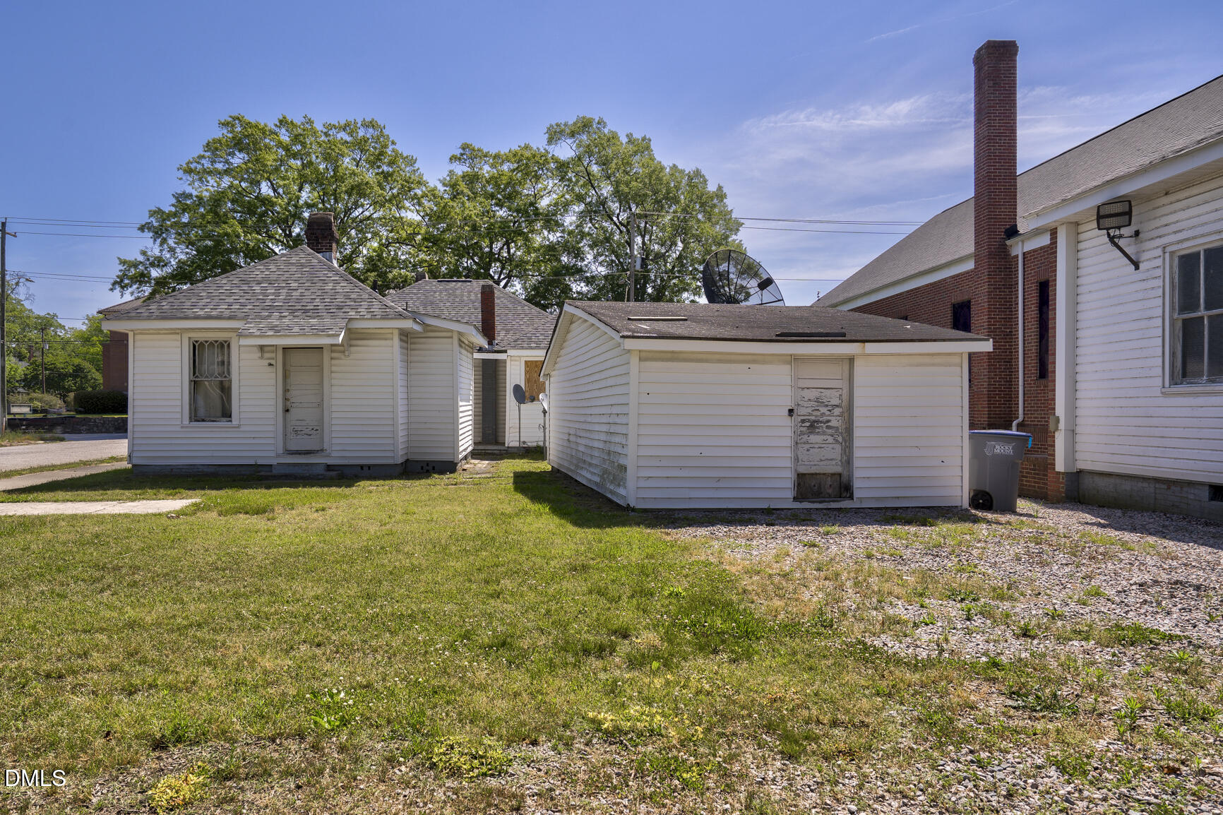 408 Cokey Road Rocky Mount, NC 27801 - Photo 11 of 46 a view of a house with a garden