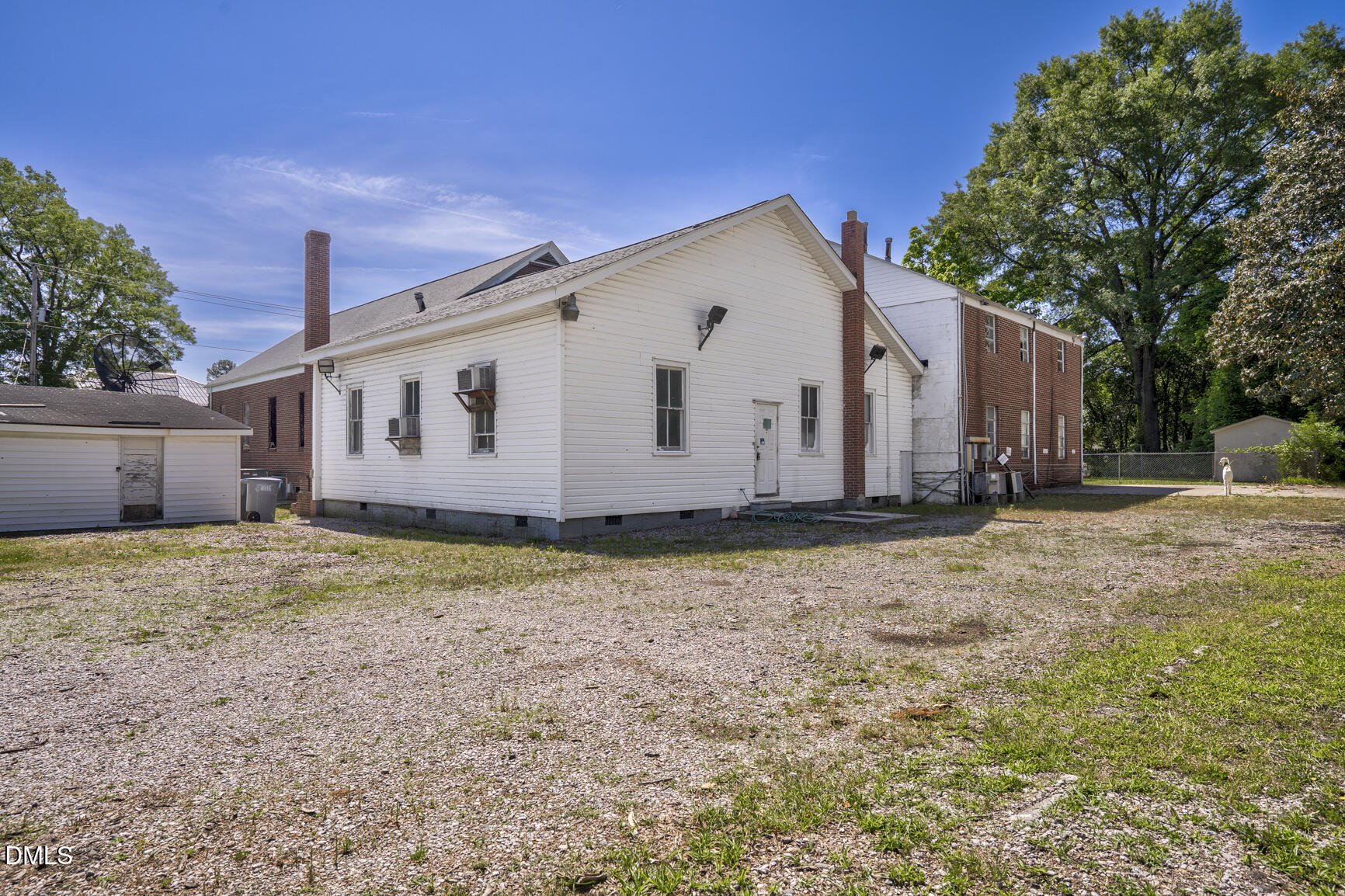 408 Cokey Road Rocky Mount, NC 27801 - Photo 12 of 46 a view of a house with backyard and tree