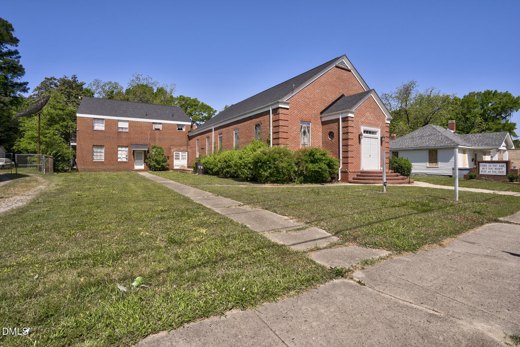 408 Cokey Road Rocky Mount, NC 27801 - Photo 16 of 46 a front view of a house with a yard