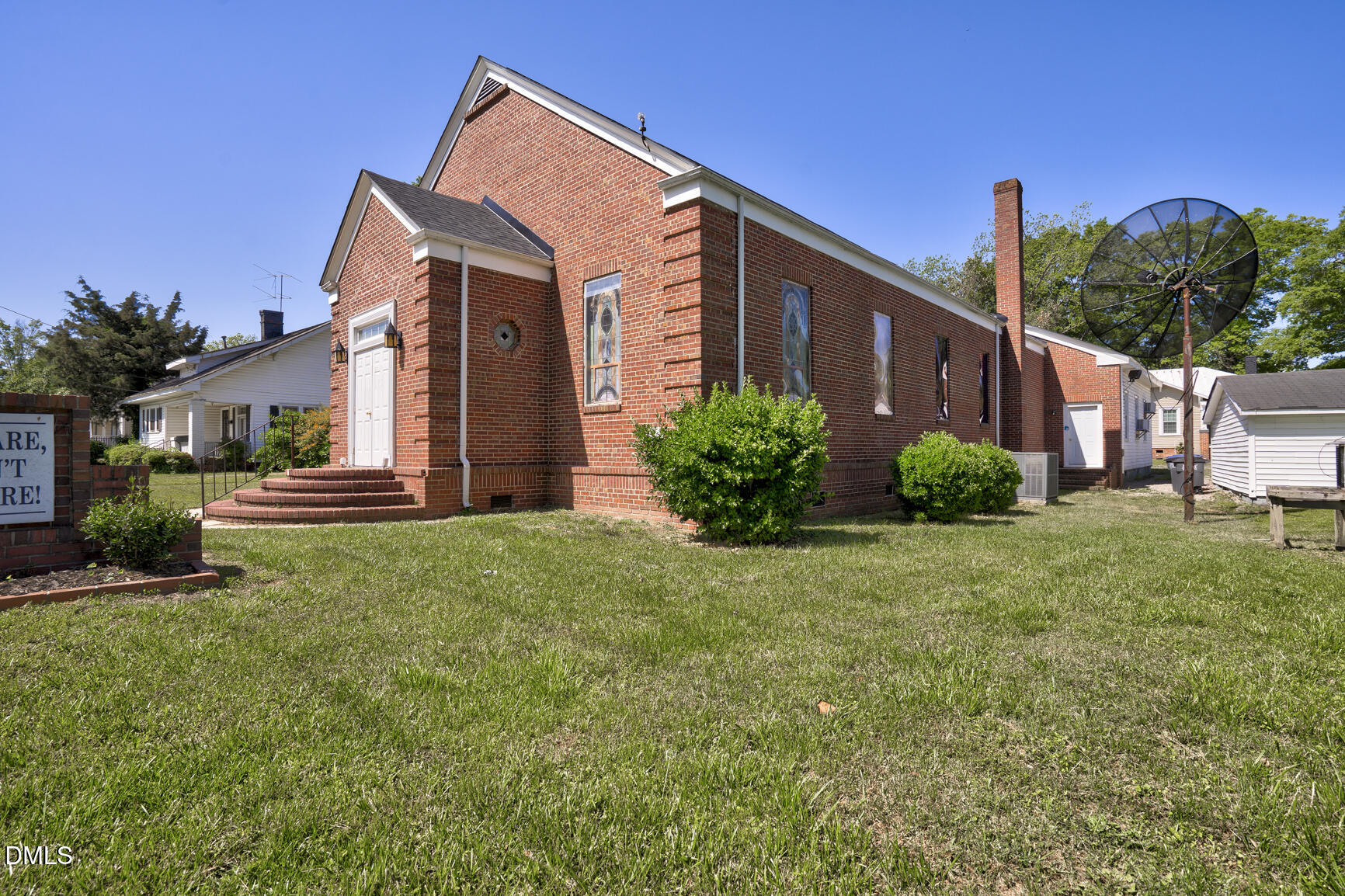 408 Cokey Road Rocky Mount, NC 27801 - Photo 19 of 46 a view of a house with backyard and garden