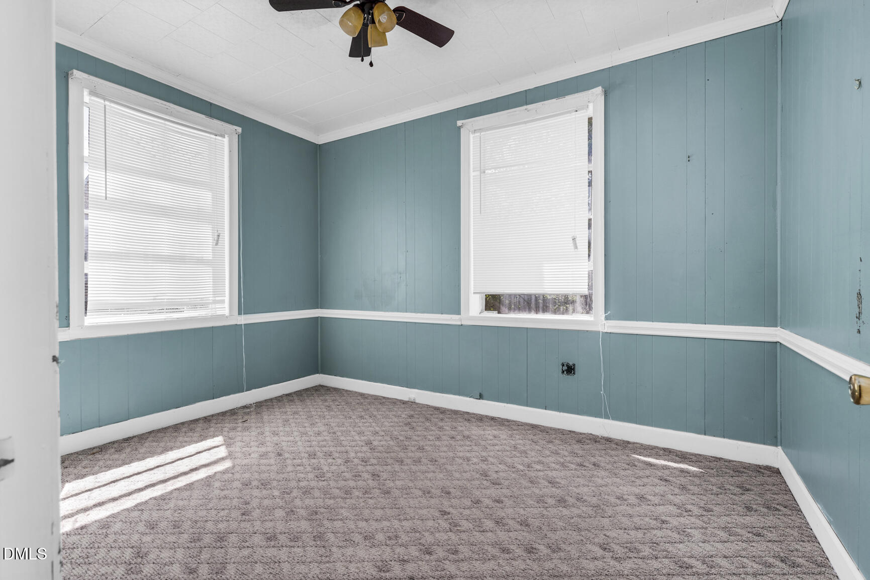 408 Cokey Road Rocky Mount, NC 27801 - Photo 27 of 46 a view of empty room with window and ceiling fan