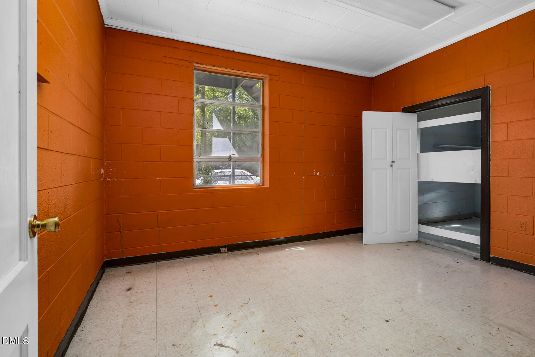 408 Cokey Road Rocky Mount, NC 27801 - Photo 28 of 46 an empty room with windows