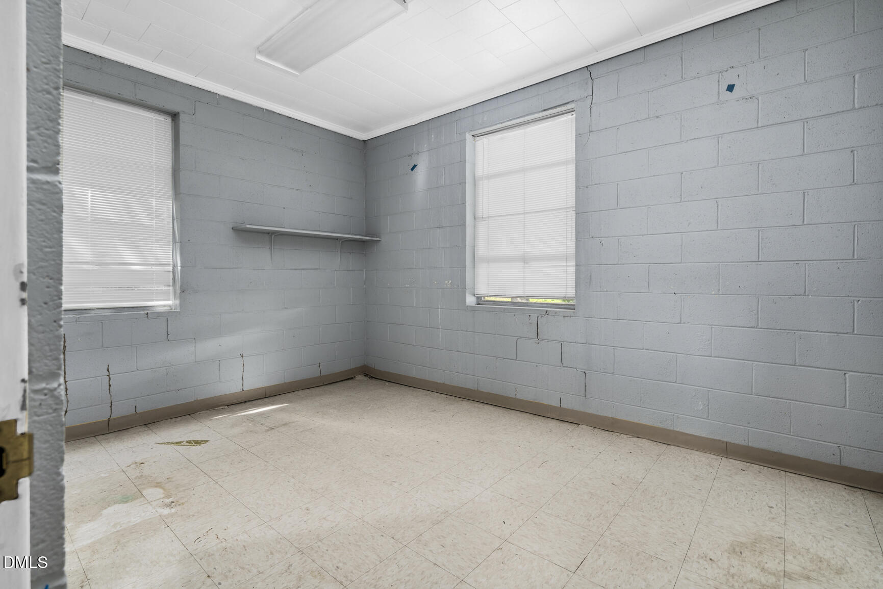 408 Cokey Road Rocky Mount, NC 27801 - Photo 29 of 46 a view of an empty room with a window