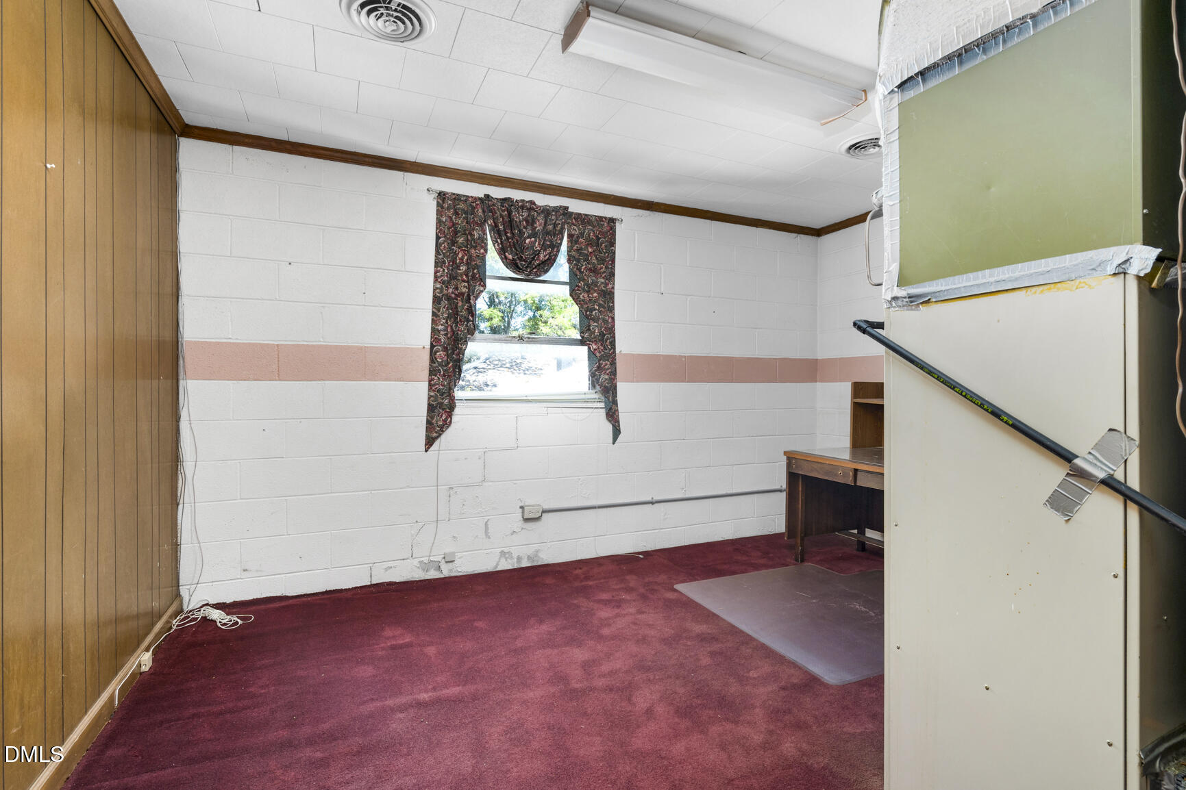 408 Cokey Road Rocky Mount, NC 27801 - Photo 33 of 46 a view of an empty room with windows