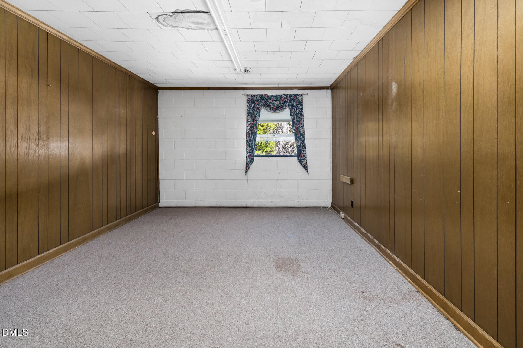 408 Cokey Road Rocky Mount, NC 27801 - Photo 34 of 46 a view of an empty room with a window