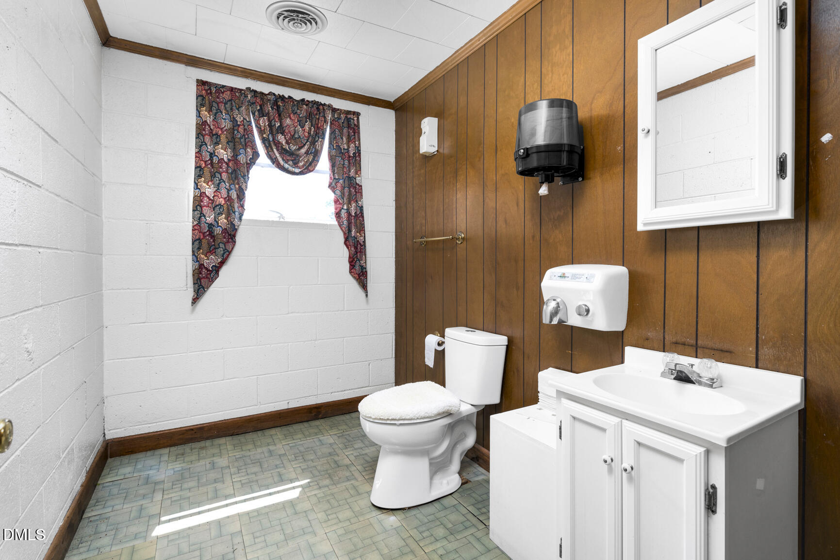 408 Cokey Road Rocky Mount, NC 27801 - Photo 38 of 46 a bathroom with a toilet sink and mirror