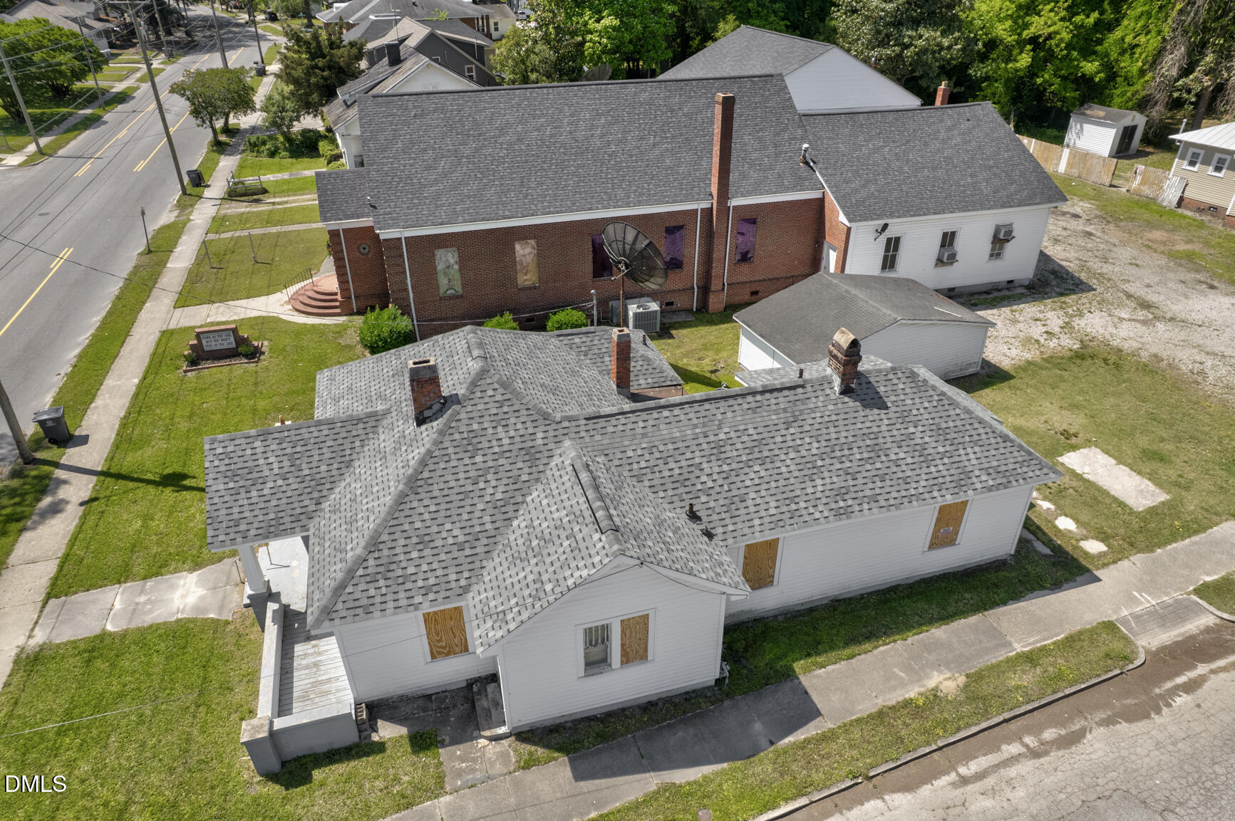 408 Cokey Road Rocky Mount, NC 27801 - Photo 4 of 46 an aerial view of a house with a yard