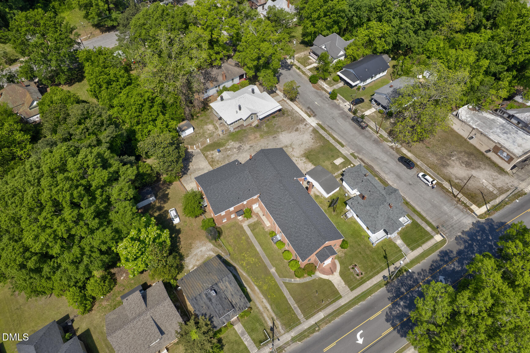 408 Cokey Road Rocky Mount, NC 27801 - Photo 46 of 46 an aerial view of a house with a yard and pool