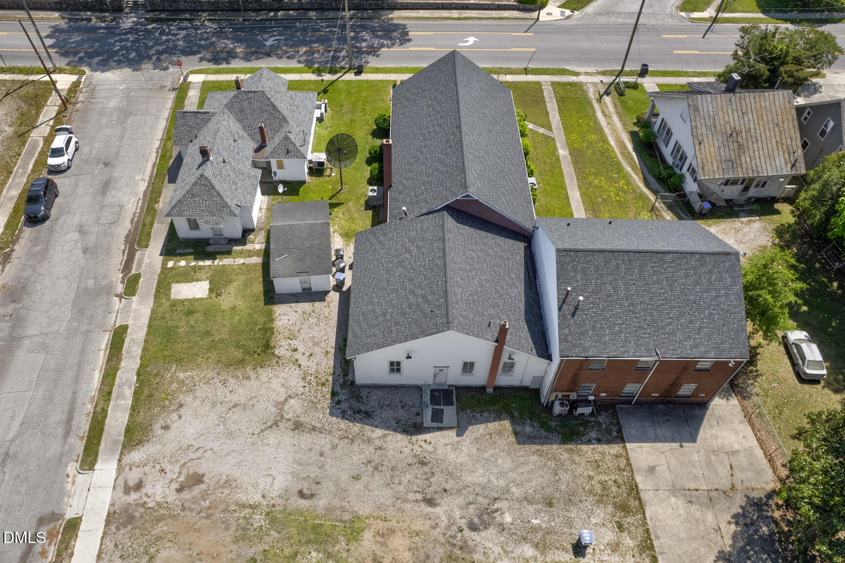 408 Cokey Road Rocky Mount, NC 27801 - Photo 5 of 46 an aerial view of a house with a swimming pool
