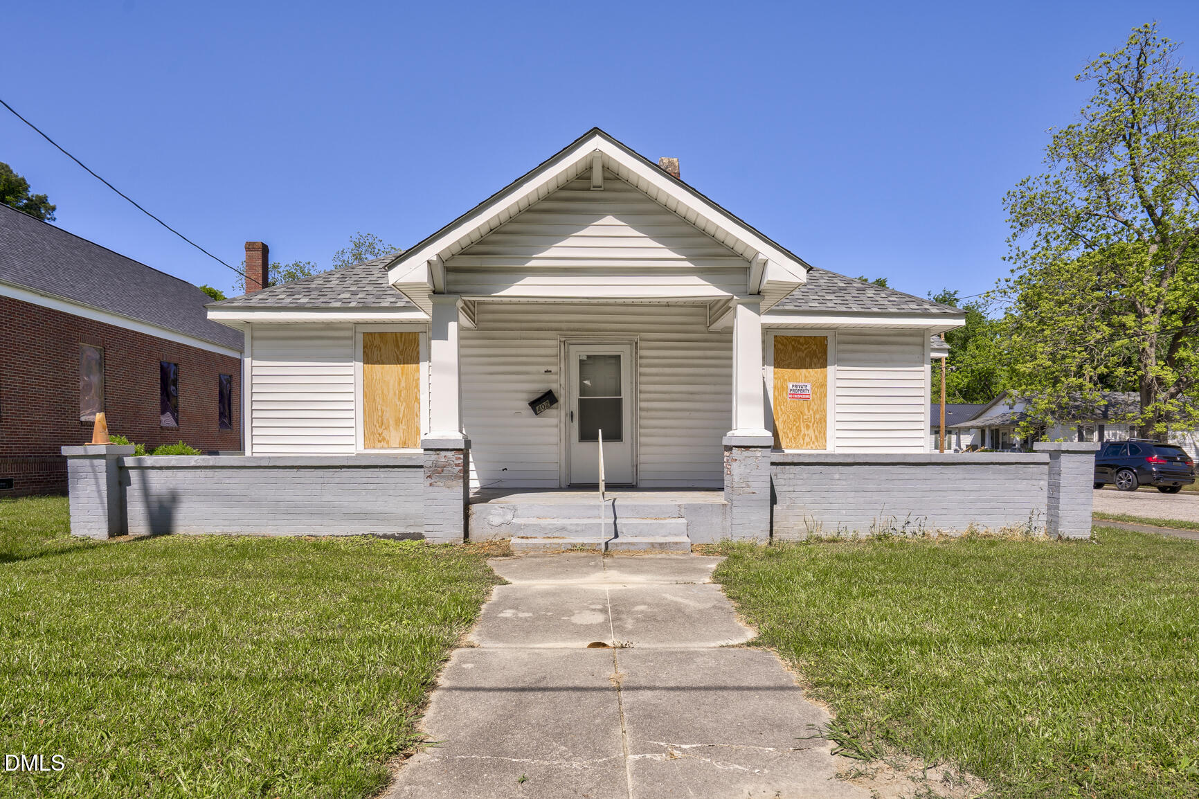408 Cokey Road Rocky Mount, NC 27801 - Photo 9 of 46 a front view of house with a yard