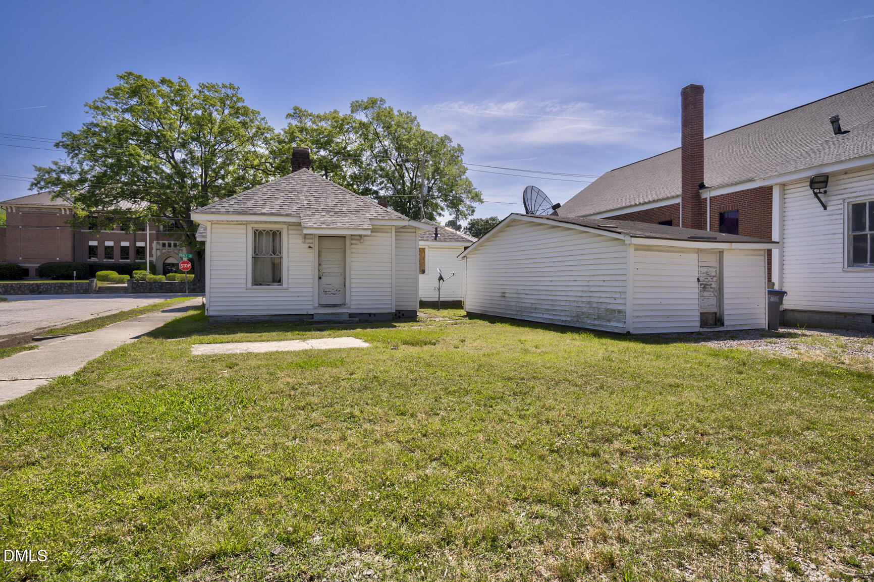 408 Cokey Road Rocky Mount, NC 27801 - Photo 10 of 46 a view of a house with a garden