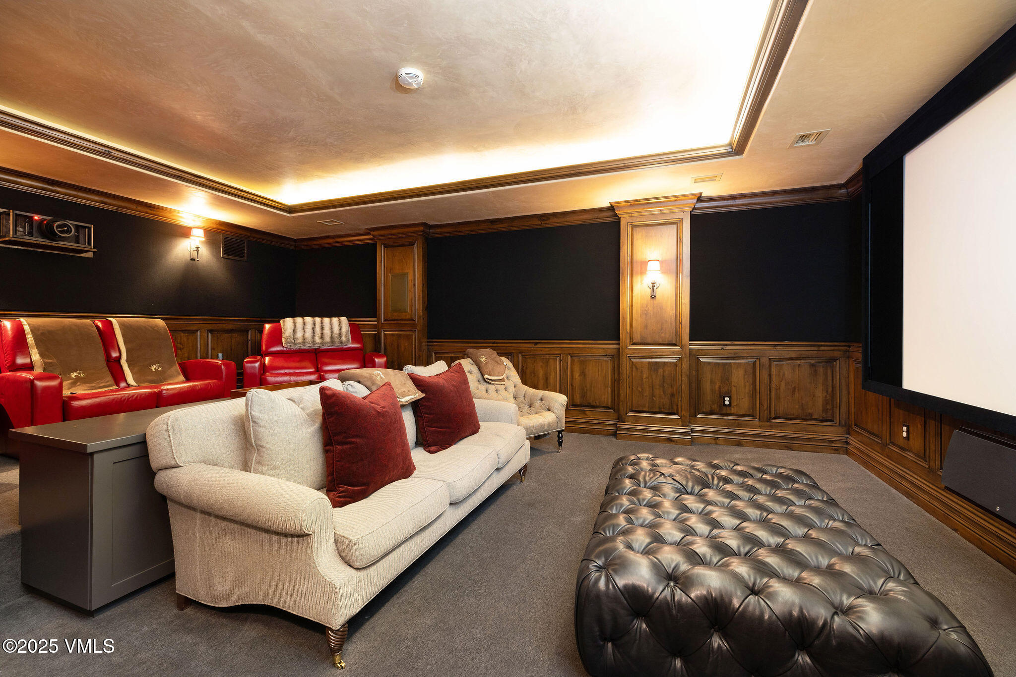 463 Borders Road Beaver Creek, CO 81620 - Photo 15 of 43 a bed room with furniture and a flat screen tv