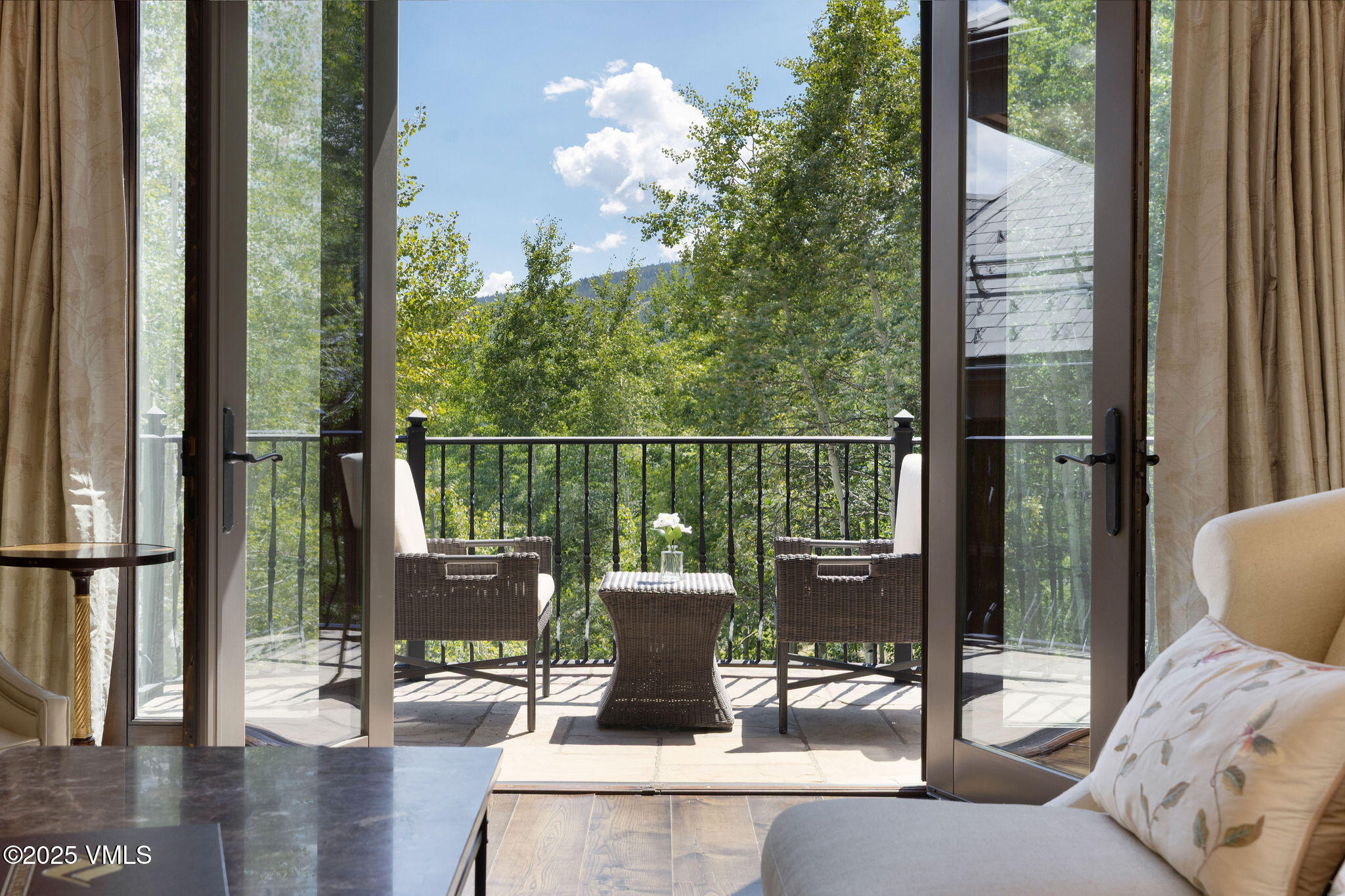 463 Borders Road Beaver Creek, CO 81620 - Photo 18 of 43 a view of a balcony with chair