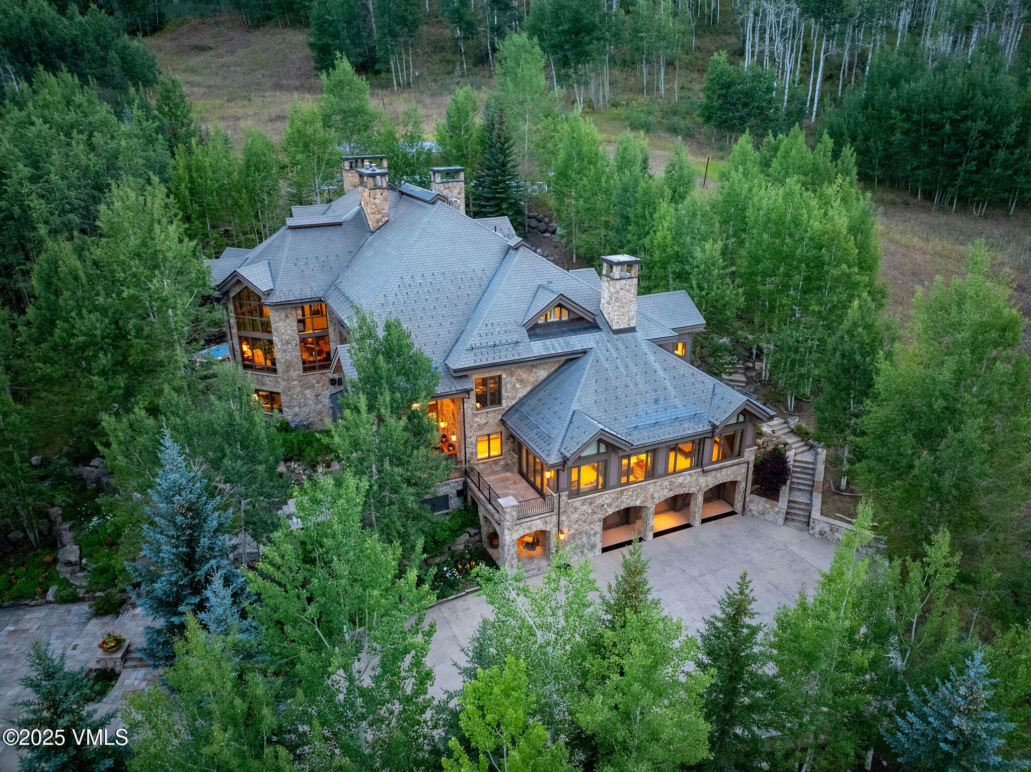 463 Borders Road Beaver Creek, CO 81620 - Photo 3 of 43 an aerial view of a house with yard swimming pool and outdoor seating