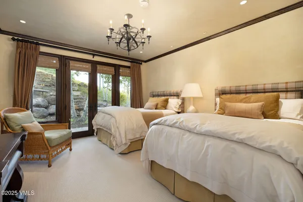 a room with gym equipment and view of living room