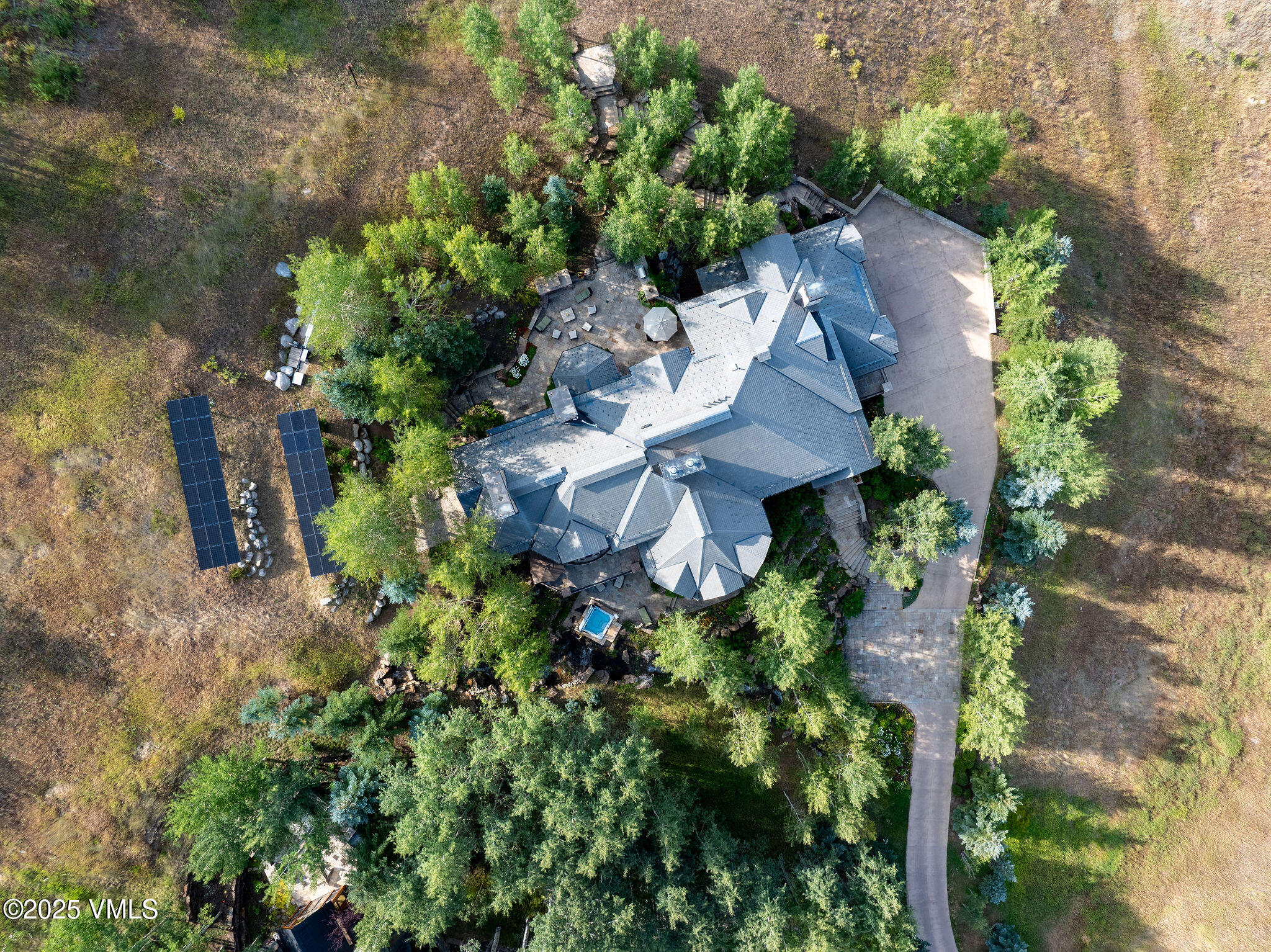 463 Borders Road Beaver Creek, CO 81620 - Photo 40 of 43 an aerial view of a house with yard