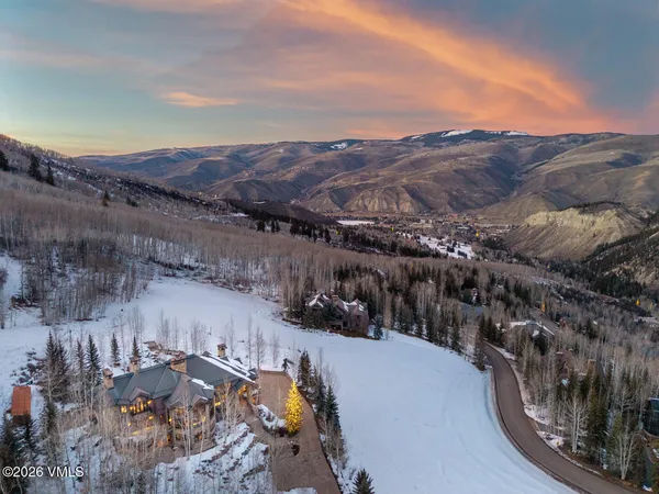 a view of a chairs and table in the outdoor
