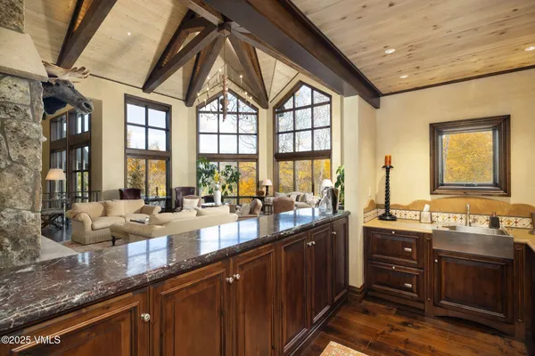 a large kitchen with lots of counter space and a large window