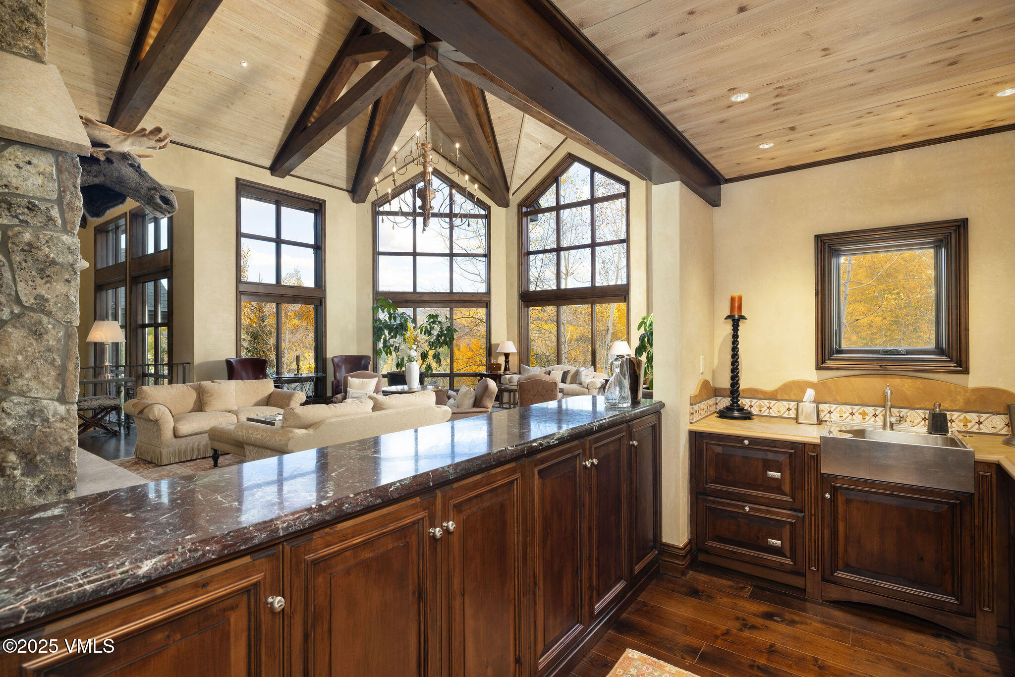 463 Borders Road Beaver Creek, CO 81620 - Photo 7 of 43 a large kitchen with lots of counter space and a large window