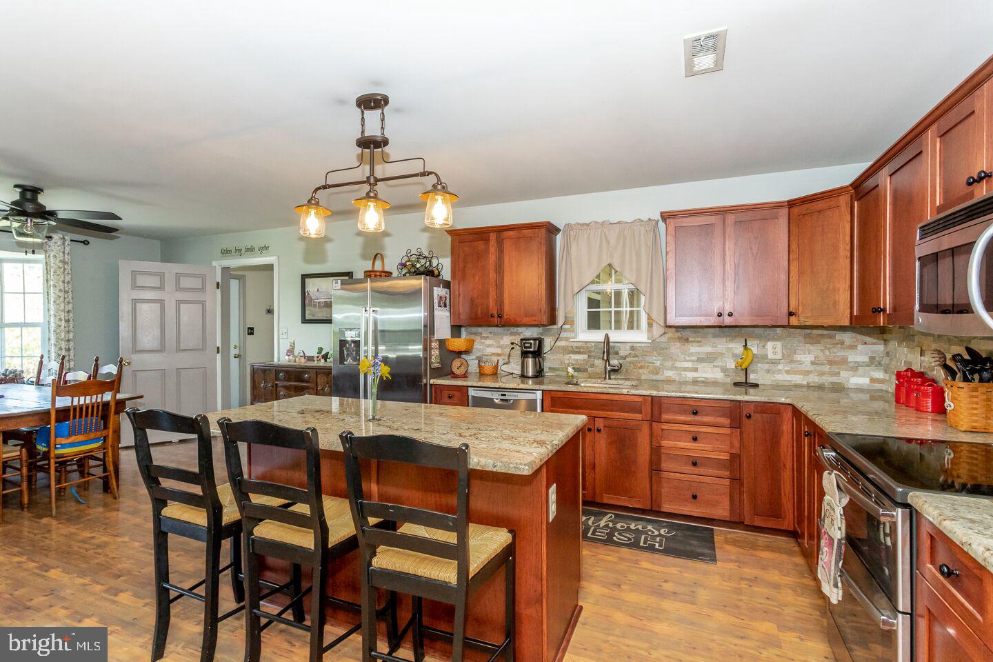 248 Stony Run Road Spring City, PA 19475 - Photo 7 of 32 Granite Counters, Seated Island, Tile Back Splash