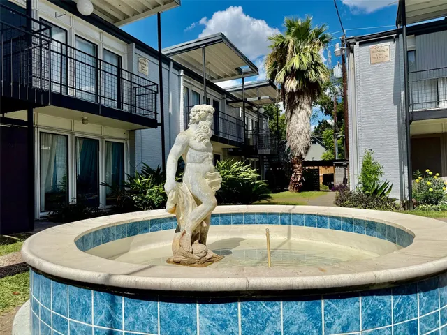 a view of a house with swimming pool