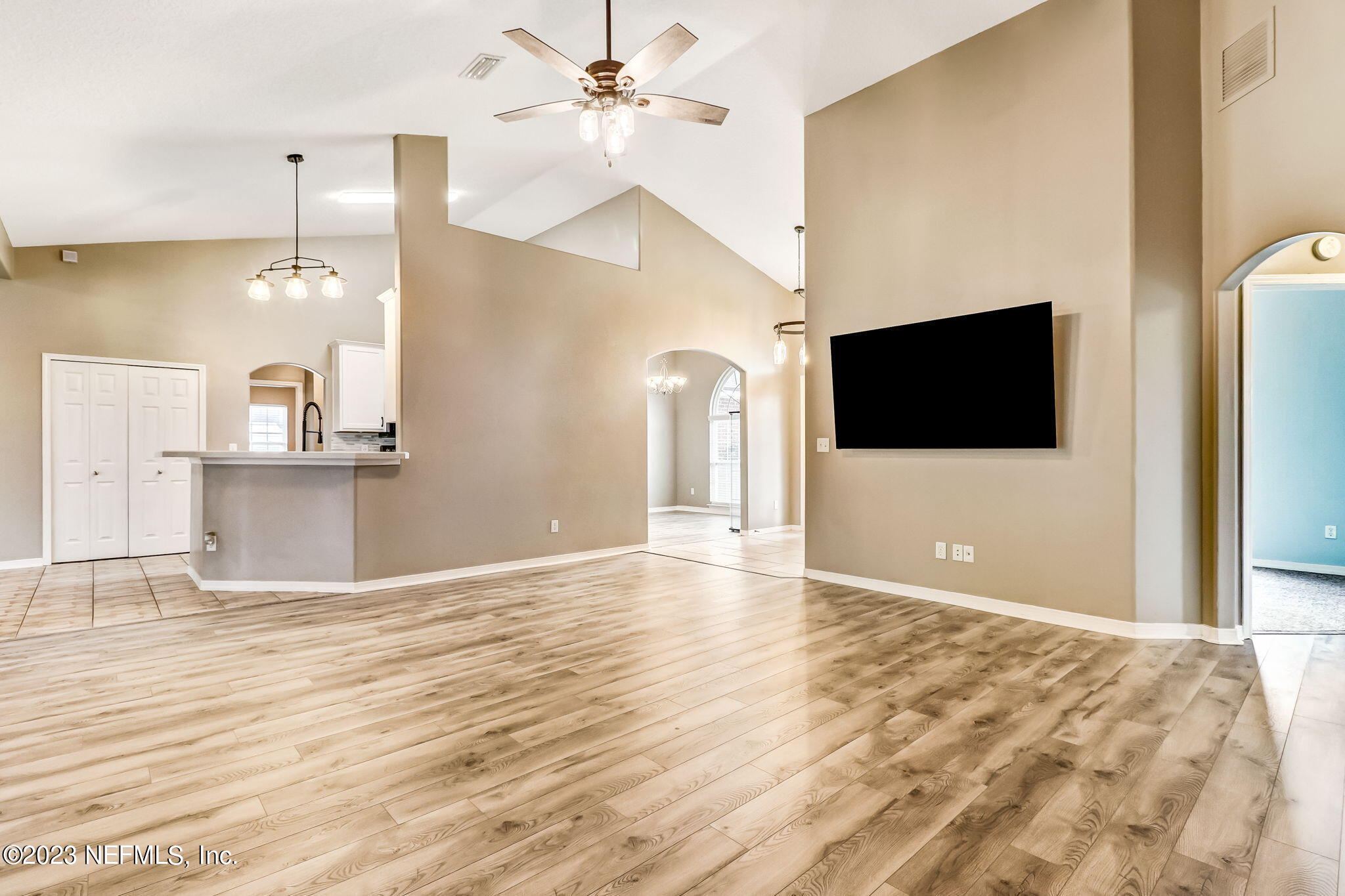 54025 Paddock Court Callahan, FL 32011 - Photo 11 of 47 a view of a livingroom with a flat screen tv