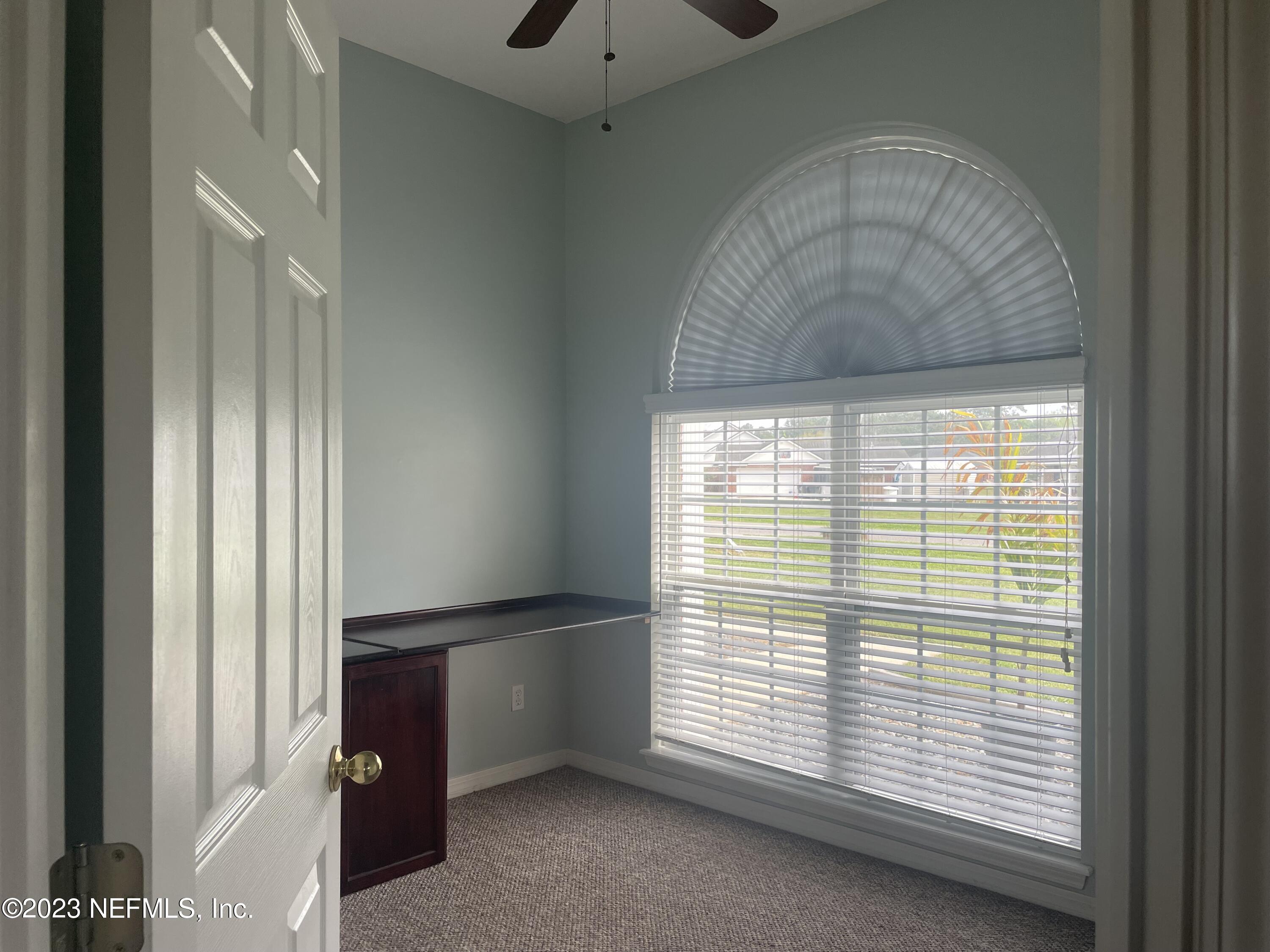 54025 Paddock Court Callahan, FL 32011 - Photo 26 of 47 a view of an empty room with a window
