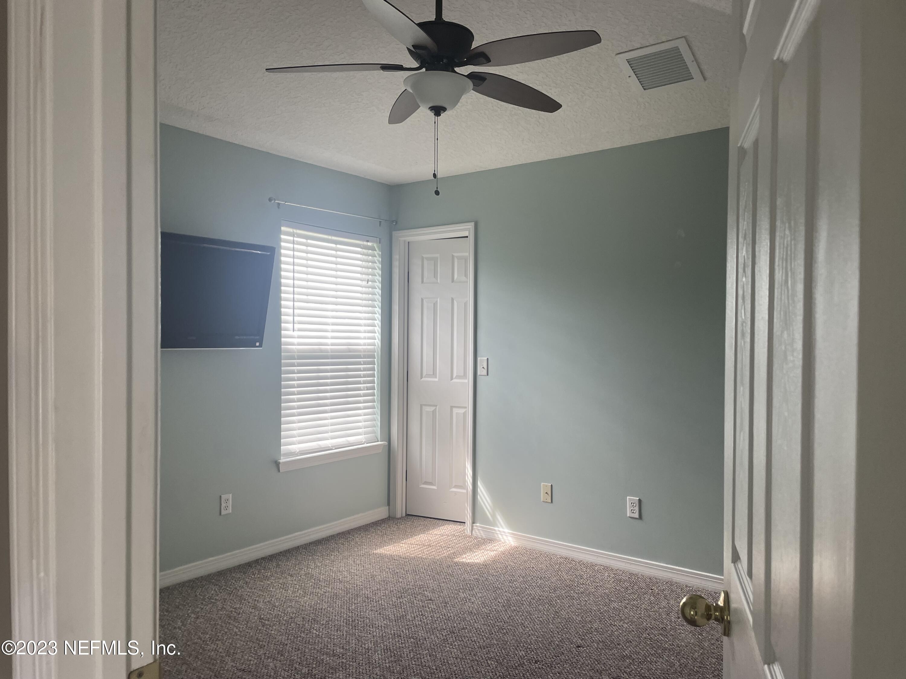 54025 Paddock Court Callahan, FL 32011 - Photo 29 of 47 a view of an empty room with a window