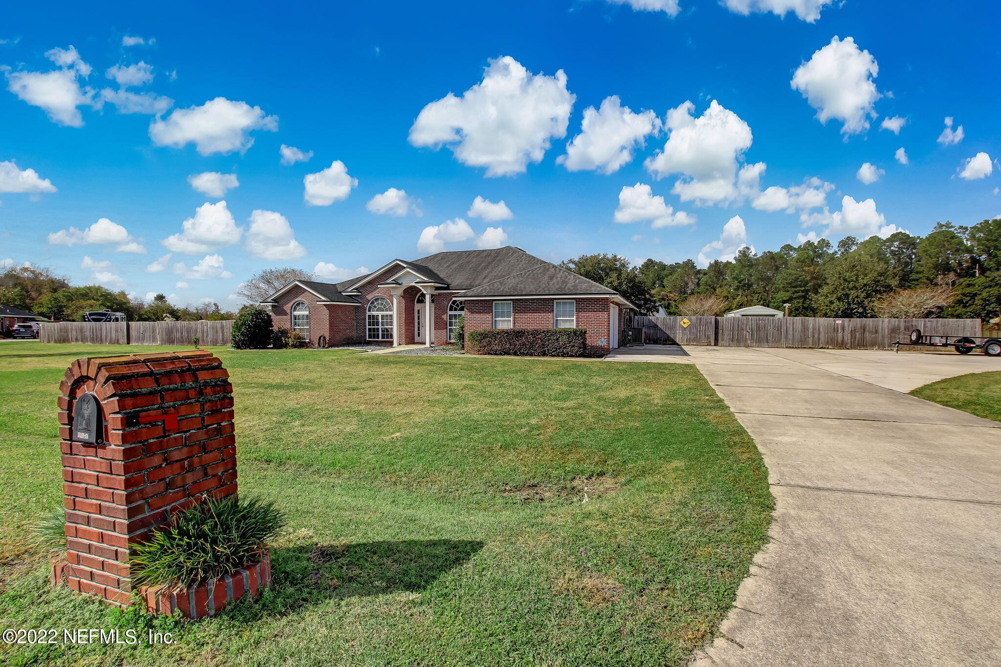 54025 Paddock Court Callahan, FL 32011 - Photo 3 of 47 a view of a house with a yard