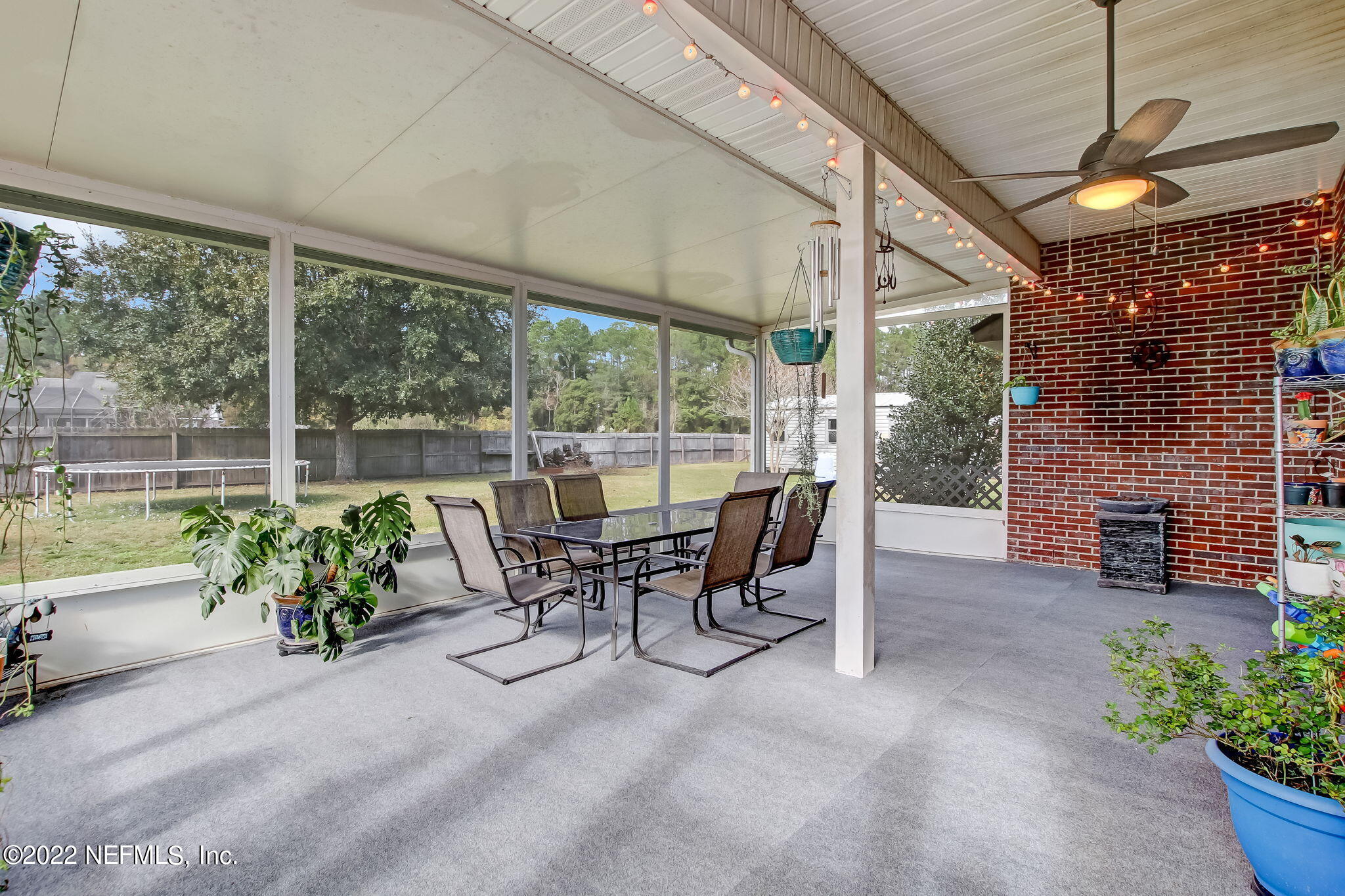 54025 Paddock Court Callahan, FL 32011 - Photo 35 of 47 a garden view with a seating space and furniture