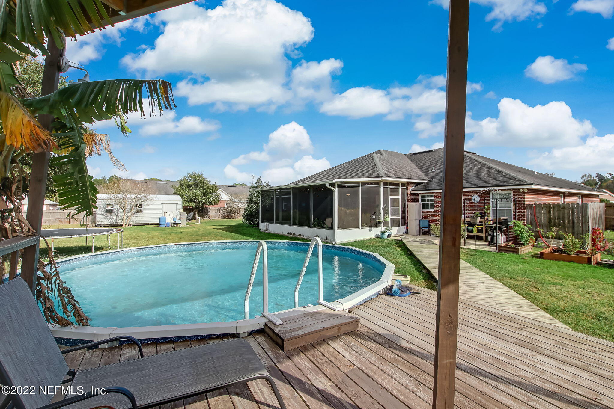 54025 Paddock Court Callahan, FL 32011 - Photo 46 of 47 a view of a house with a swimming pool