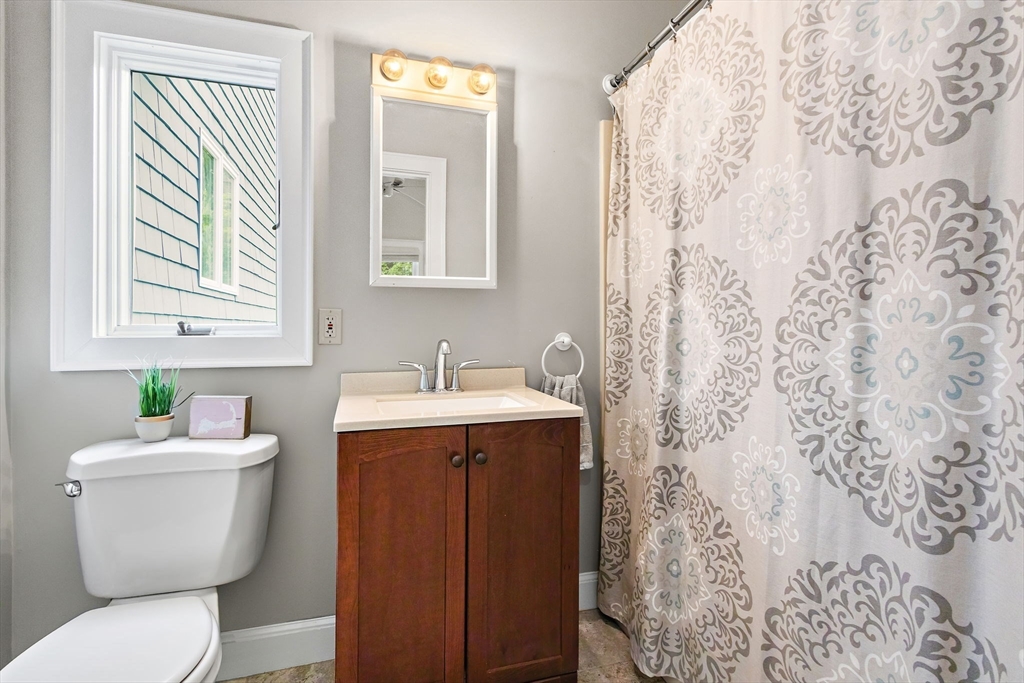 61 Pine Ridge Drive Franklin, MA 02038 - Photo 8 of 41 a bathroom with a sink toilet and shower