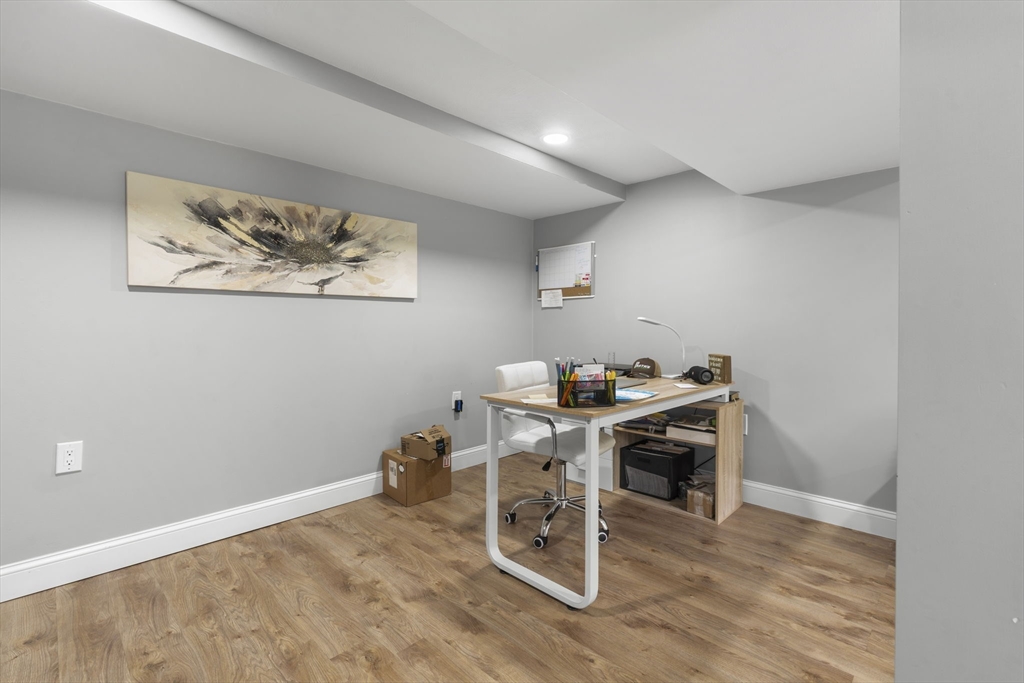 8 Governor Fuller Road Billerica, MA 01821 - Photo 24 of 33 a view of a workspace with furniture and wooden floor