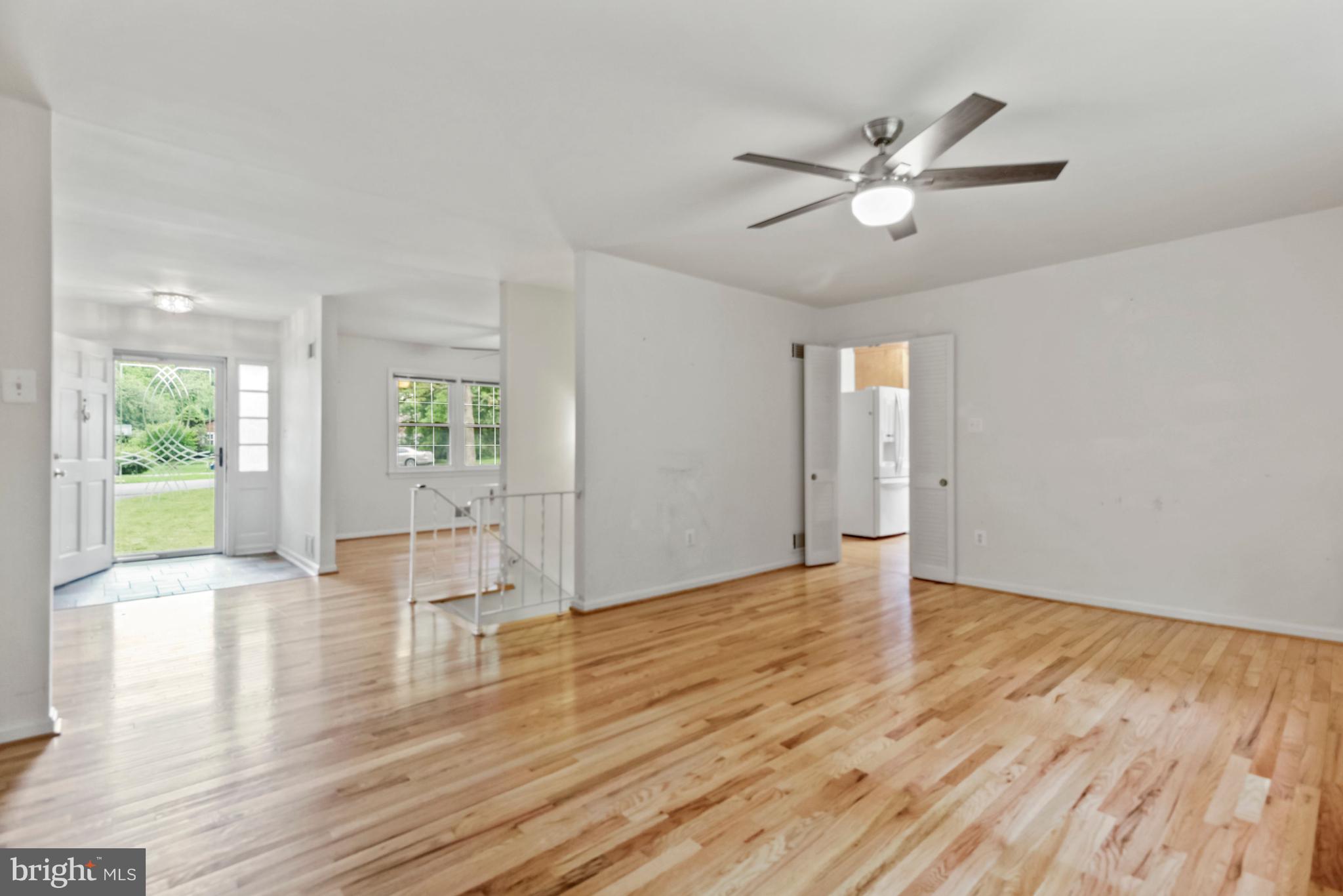 14908 Claude Lane Silver Spring, MD 20905 - Photo 12 of 37 Living Room Leads to Kitchen
