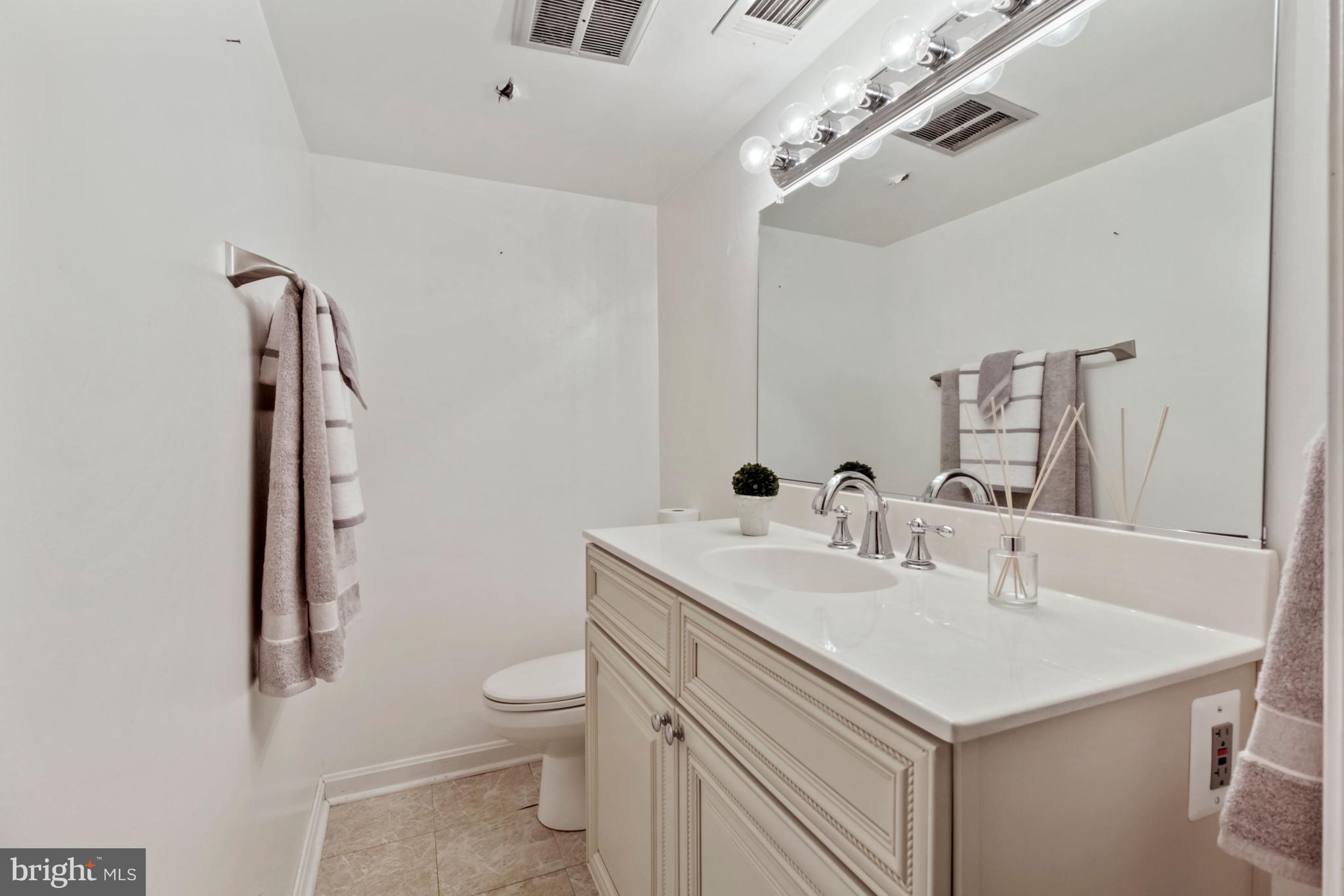 14908 Claude Lane Silver Spring, MD 20905 - Photo 32 of 37 Lower Level Powder Room