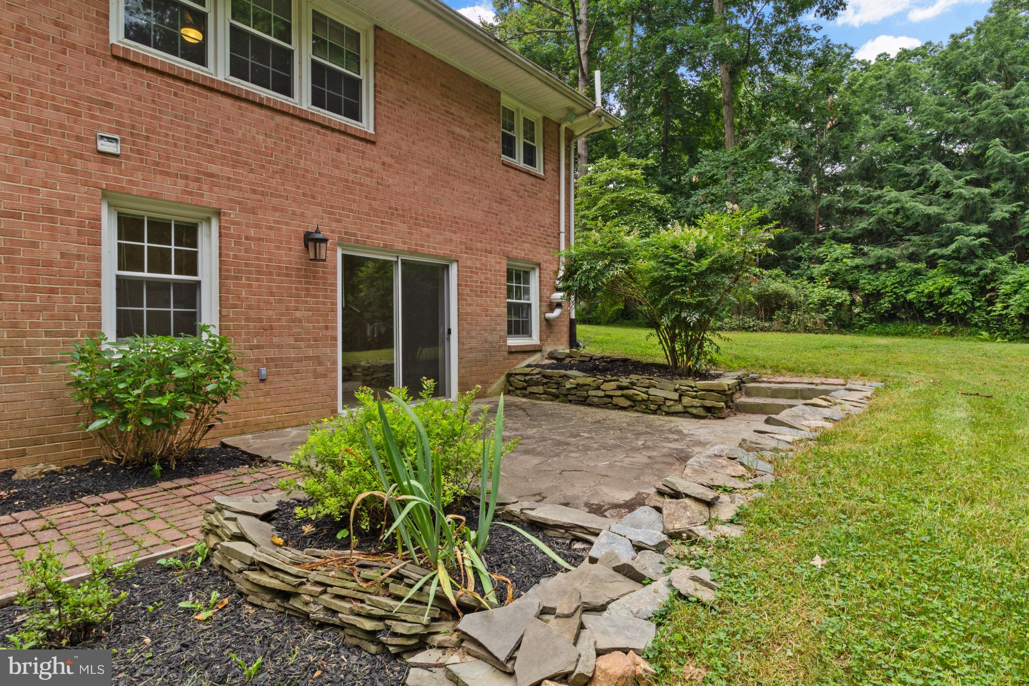 14908 Claude Lane Silver Spring, MD 20905 - Photo 33 of 37 Rear Patio Accessible From Lower Level Family Room