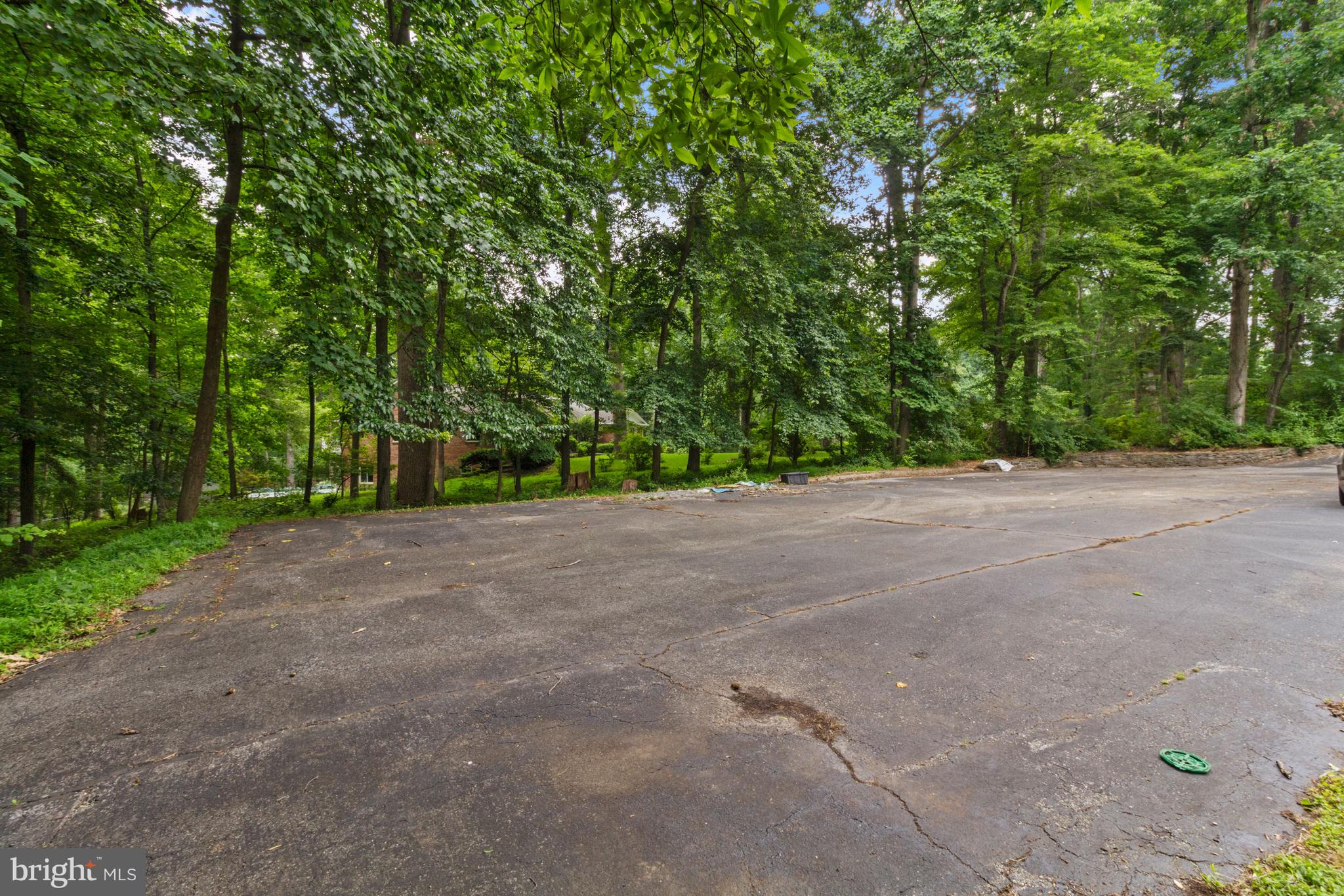 14908 Claude Lane Silver Spring, MD 20905 - Photo 36 of 37 Expansive Driveway Accommodates Multiple Vehicles